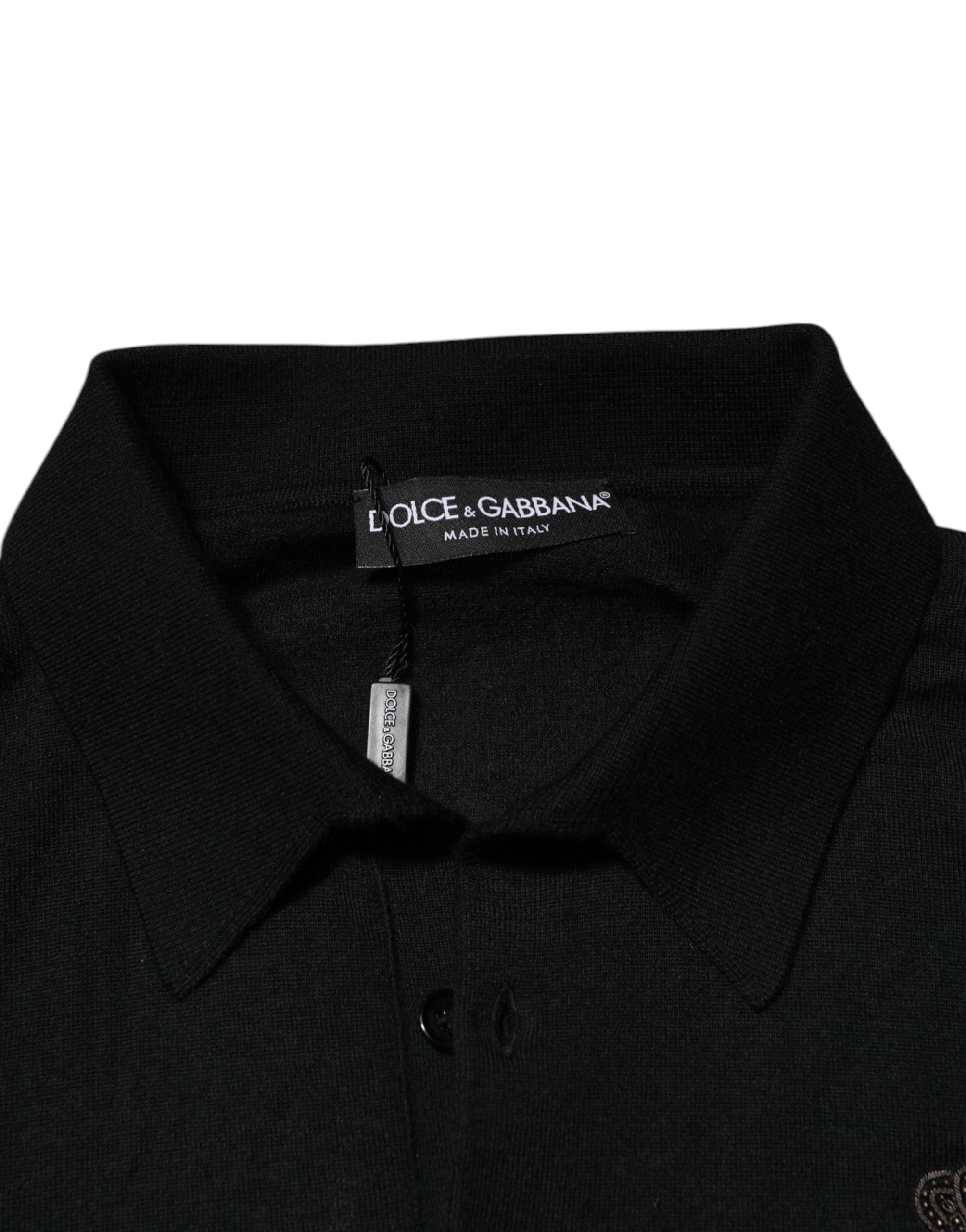 Pull homme Dolce & Gabbana noir avec motif de blason à manches longues et col rond, en tissu doux et confortable.