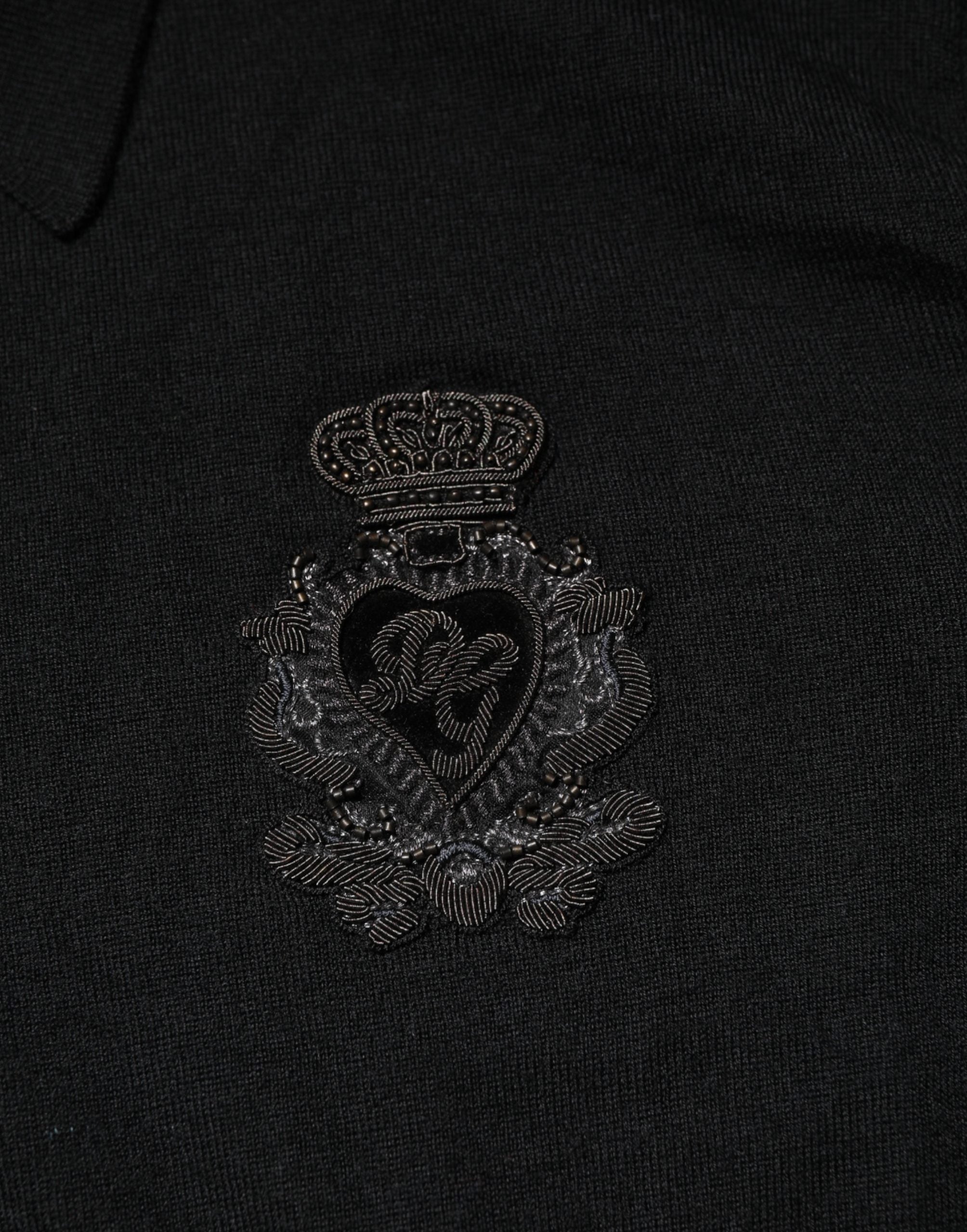 Pull noir à manches longues Dolce & Gabbana avec blason élégant, pullover pour homme en laine douce.