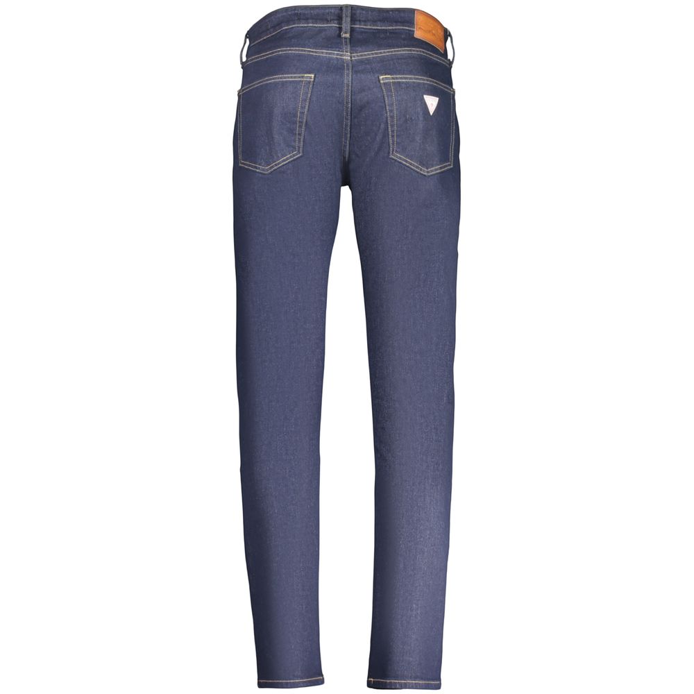 Jeans homme Guess Jeans en coton bleu, coupe classique, avec poche avant et détails en denim visible sur l'image.