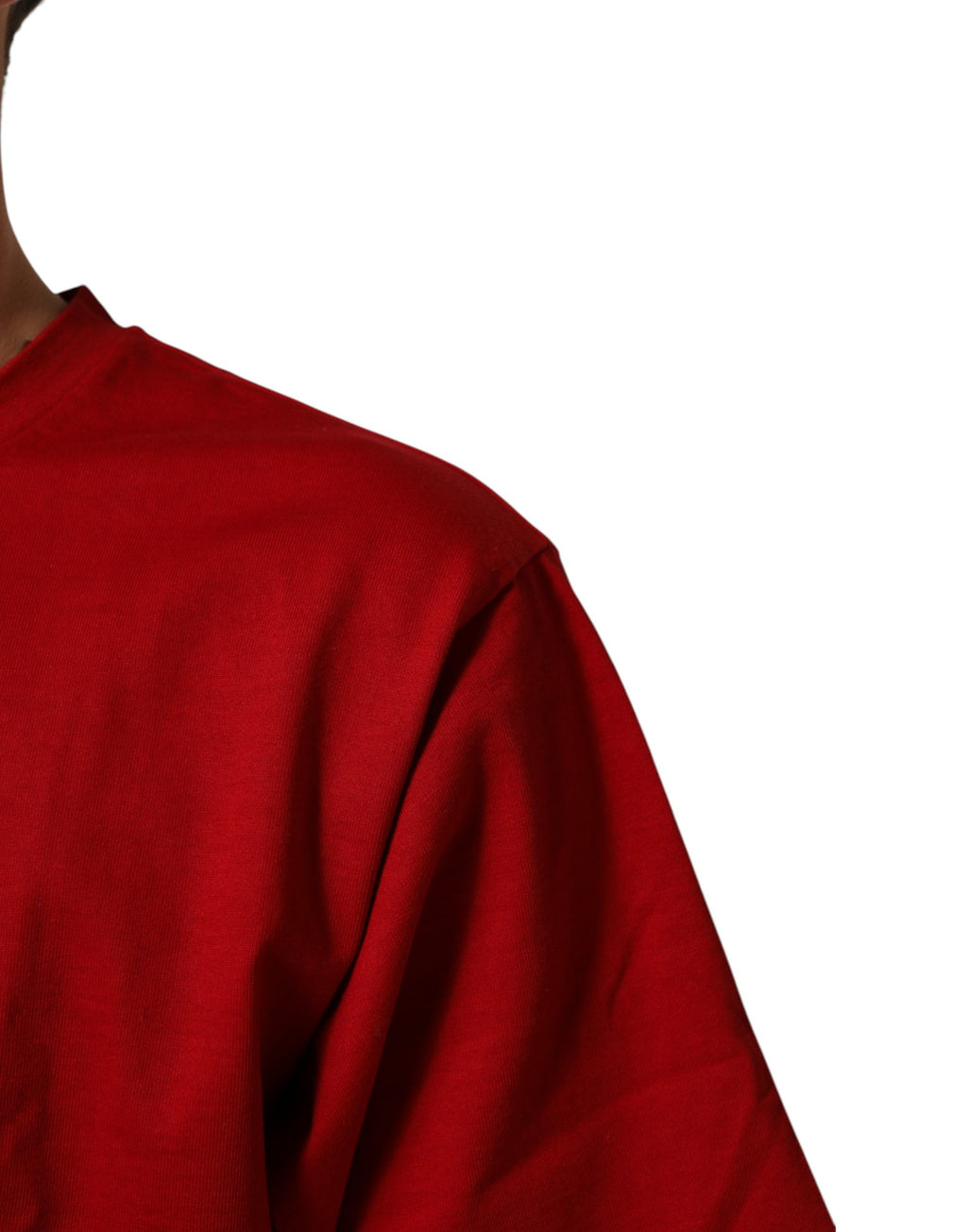T-shirt en coton rouge Dolce & Gabbana avec motif œil DG, col rond, design tendance et logo visible sur l'image.