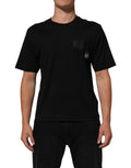 T-shirt noir en coton Dolce & Gabbana avec logo en plaque sur la poitrine, col rond et design élégant.