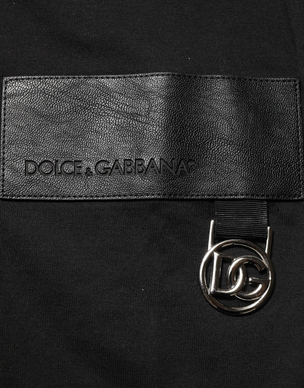 T-shirt à manches courtes Dolce & Gabbana en coton noir avec plaque logo, col rond et design épuré.