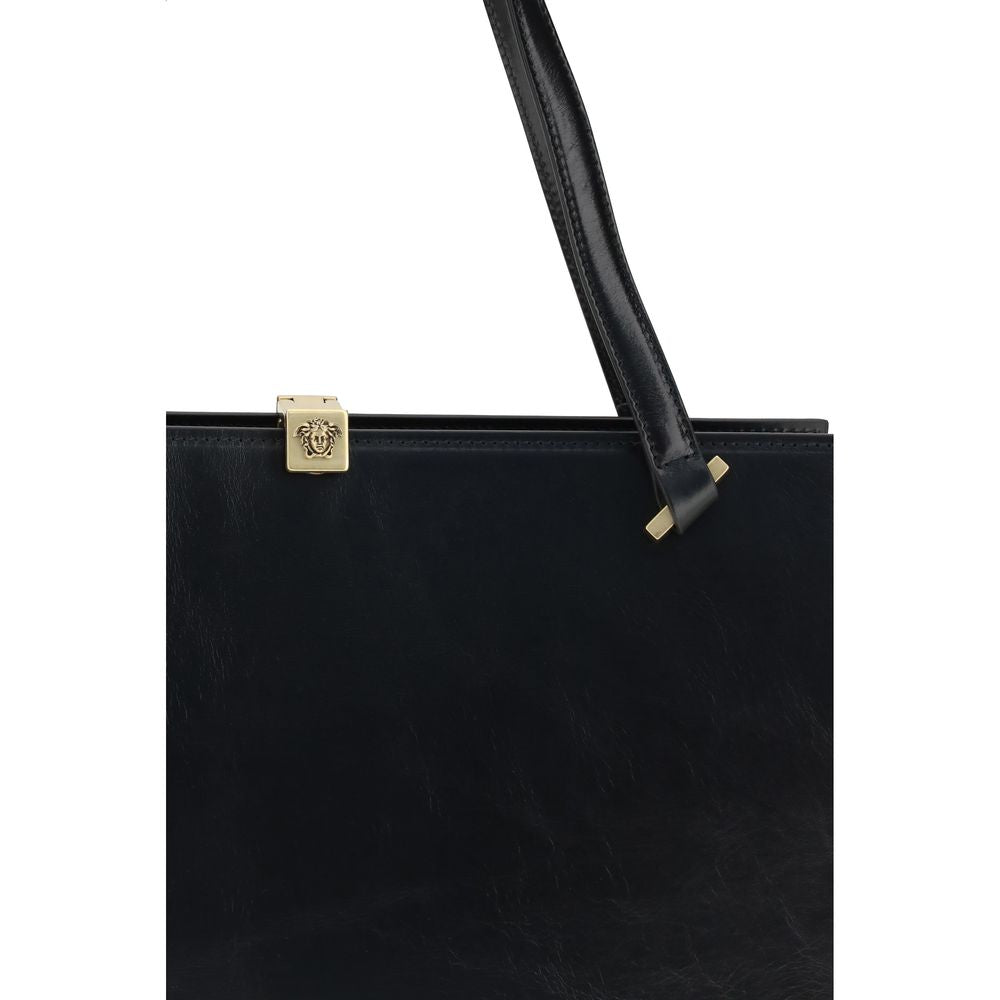 Sac à main Versace Bos Taurus en cuir de veau noir, style épuré et élégant, avec détails métalliques.