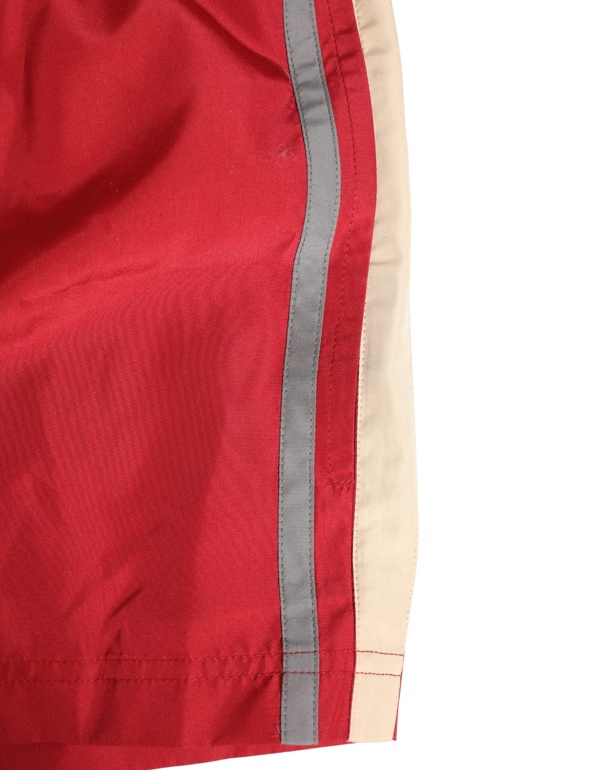 Shorts de bain pour homme Dolce & Gabbana en polyester rouge avec cordon de serrage, style décontracté et confortable.