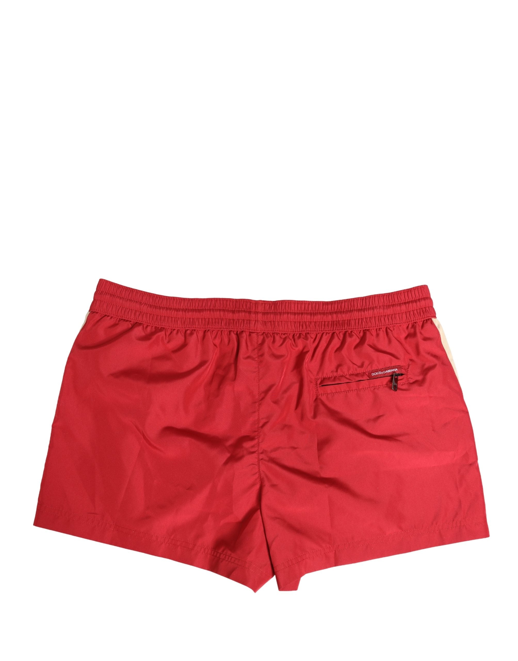 Shorts de bain homme en polyester rouge Dolce & Gabbana avec cordon de serrage, style décontracté et tendance.