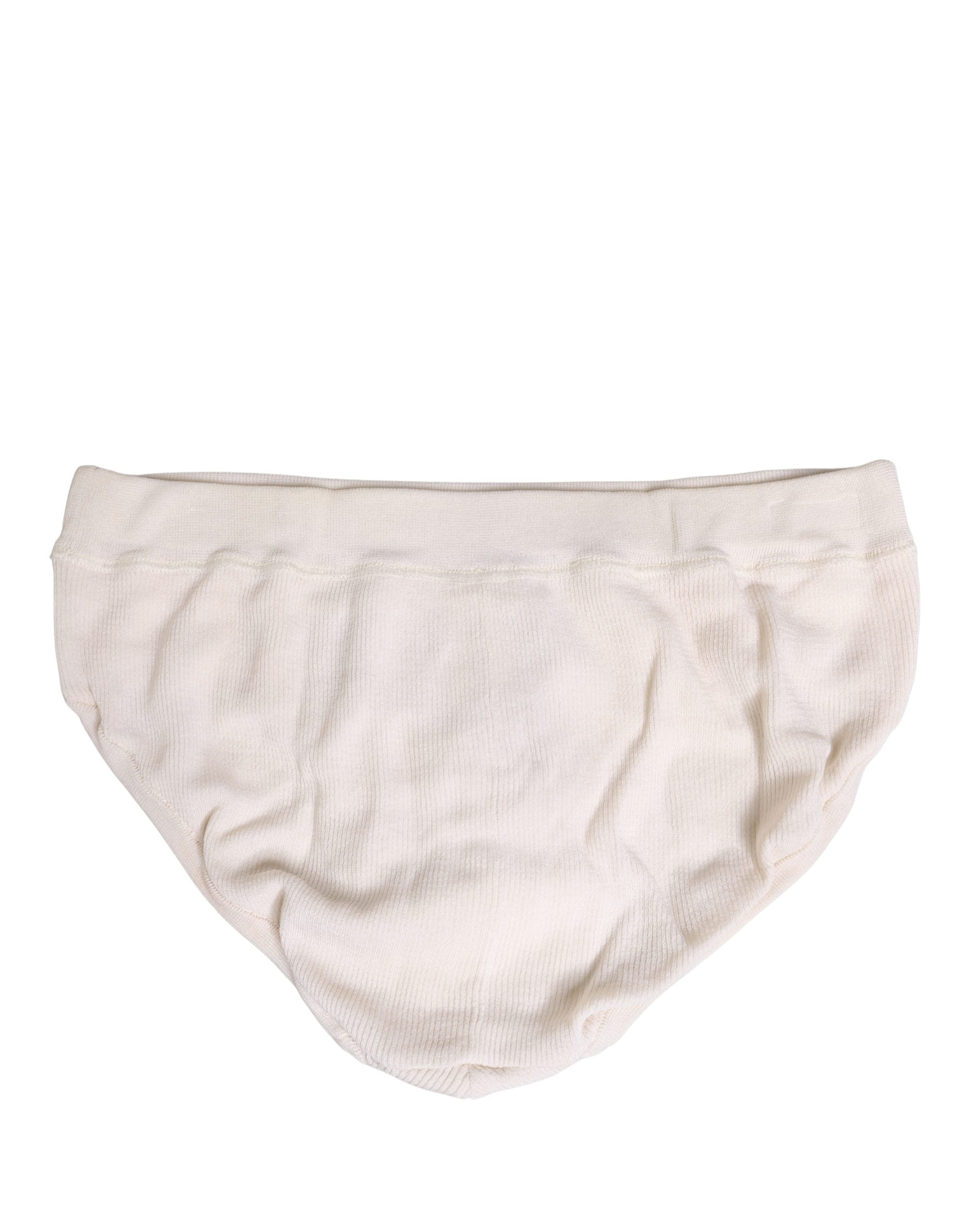 Sous-vêtements homme Dolce & Gabbana en soie blanche avec logo, style slip élégant et confortable.