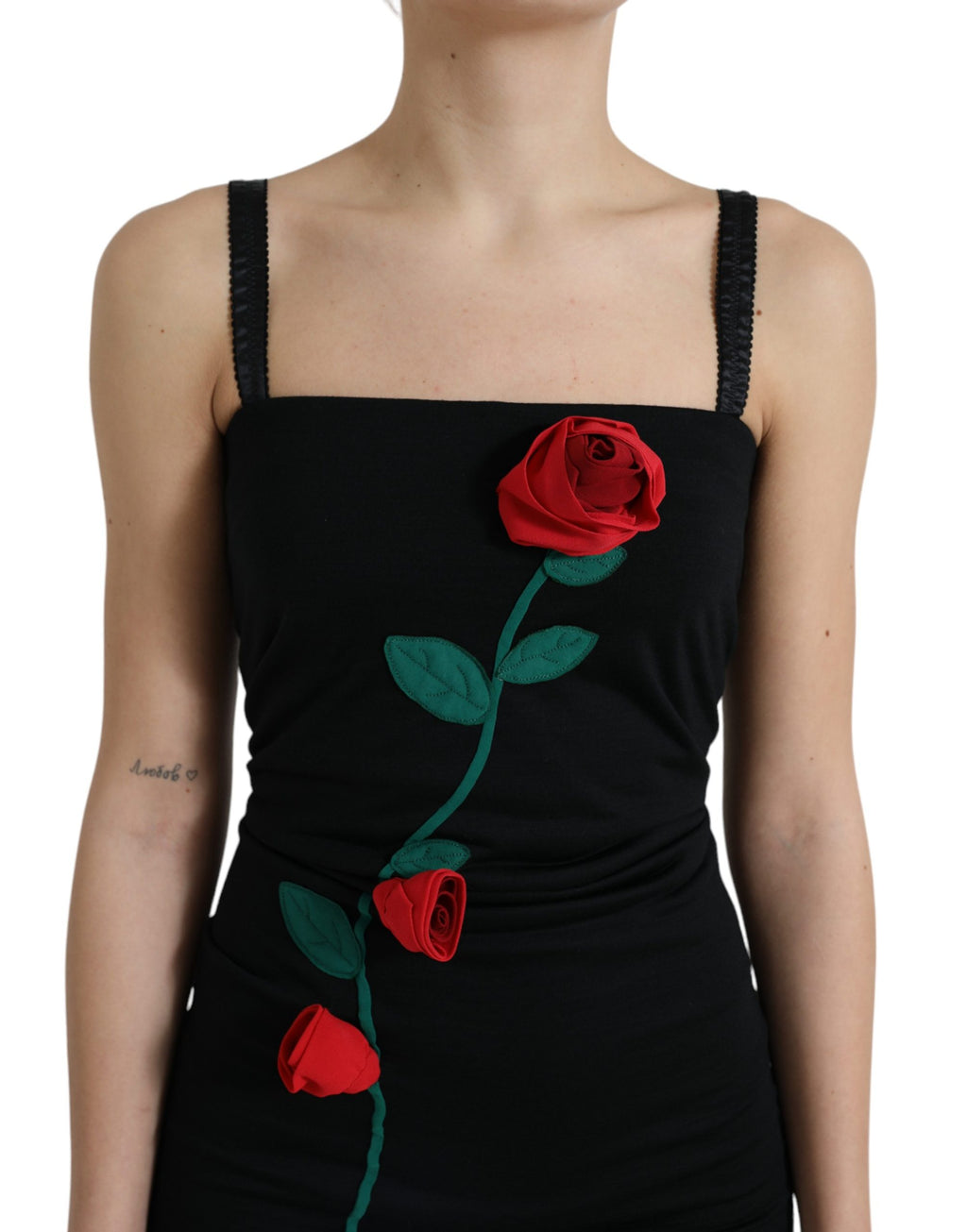 Robe sans manches en laine noire Dolce & Gabbana avec appliqués de roses, élégante et sophistiquée.