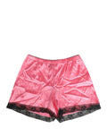 Shorts de pyjama en soie rose Dolce & Gabbana avec dentelle et finition satin, vêtement de nuit élégant et confortable.
