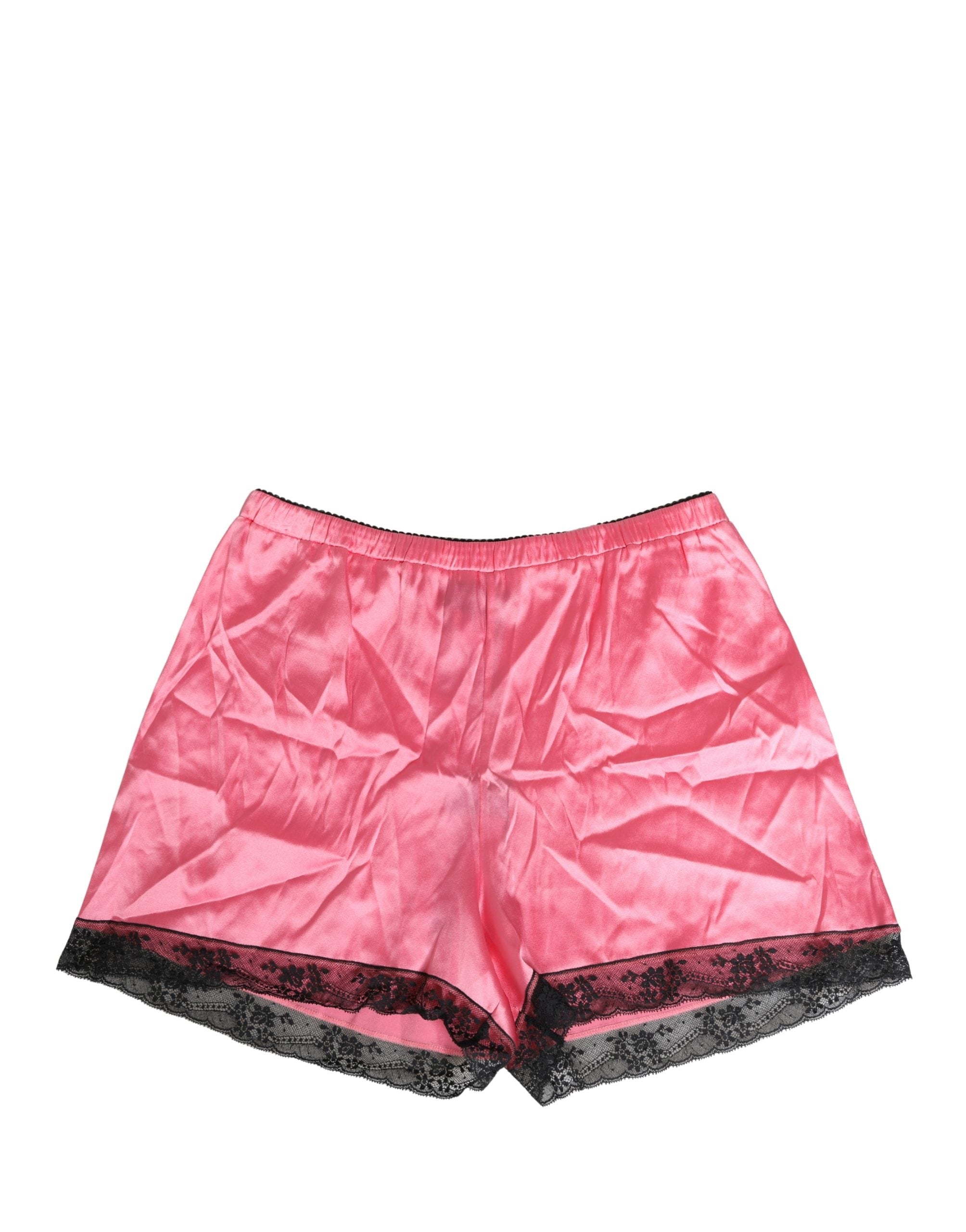 Shorts de pyjama en soie rose Dolce & Gabbana avec bordure en dentelle, sommeil élégant et confortable.