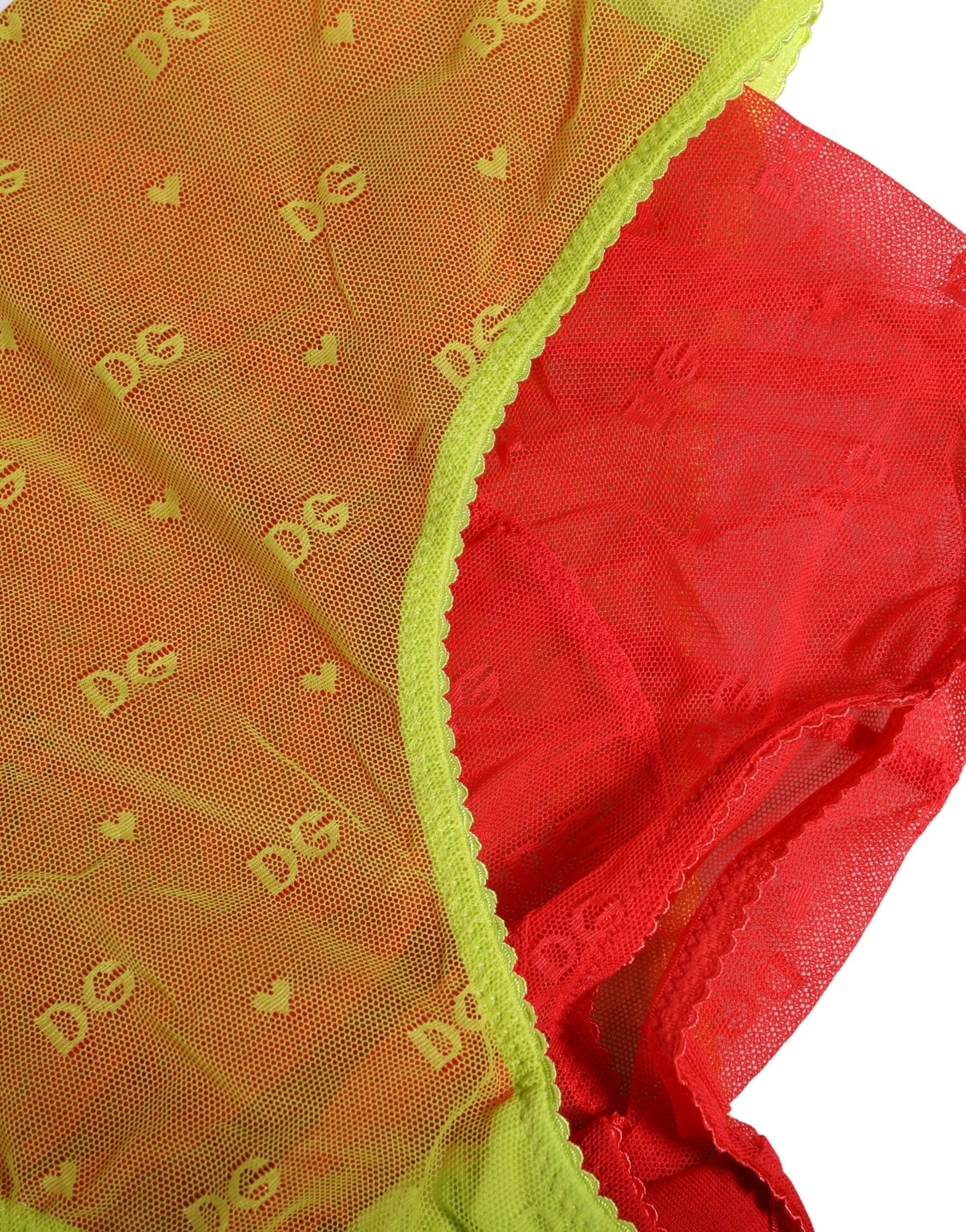 Culotte haute en tulle rouge et jaune de Dolce & Gabbana, sous-vêtements à taille mi-hauteur, style élégant et confortable.
