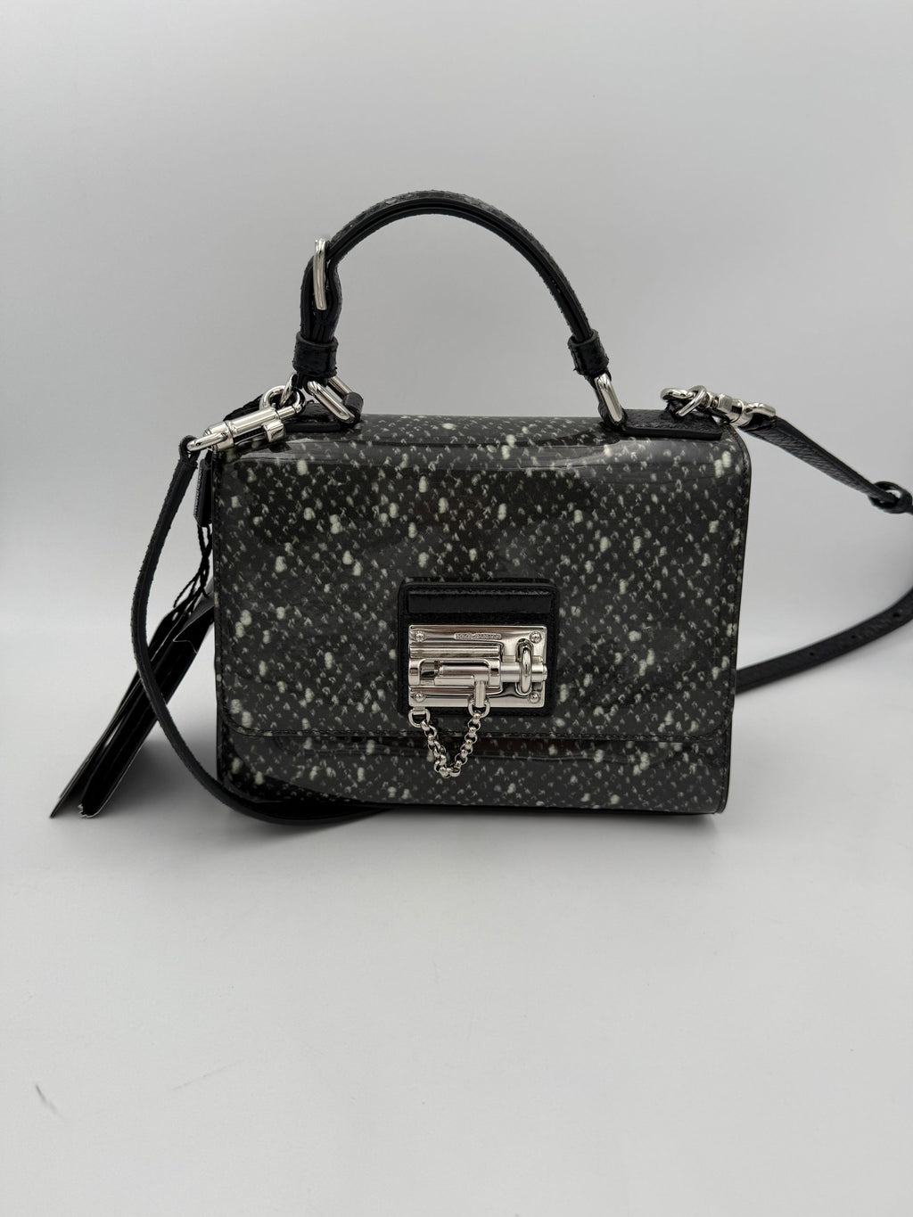 Sac à main Dolce & Gabbana Monica en python et cuir verni, élégant et sophistiqué, avec détails en or.