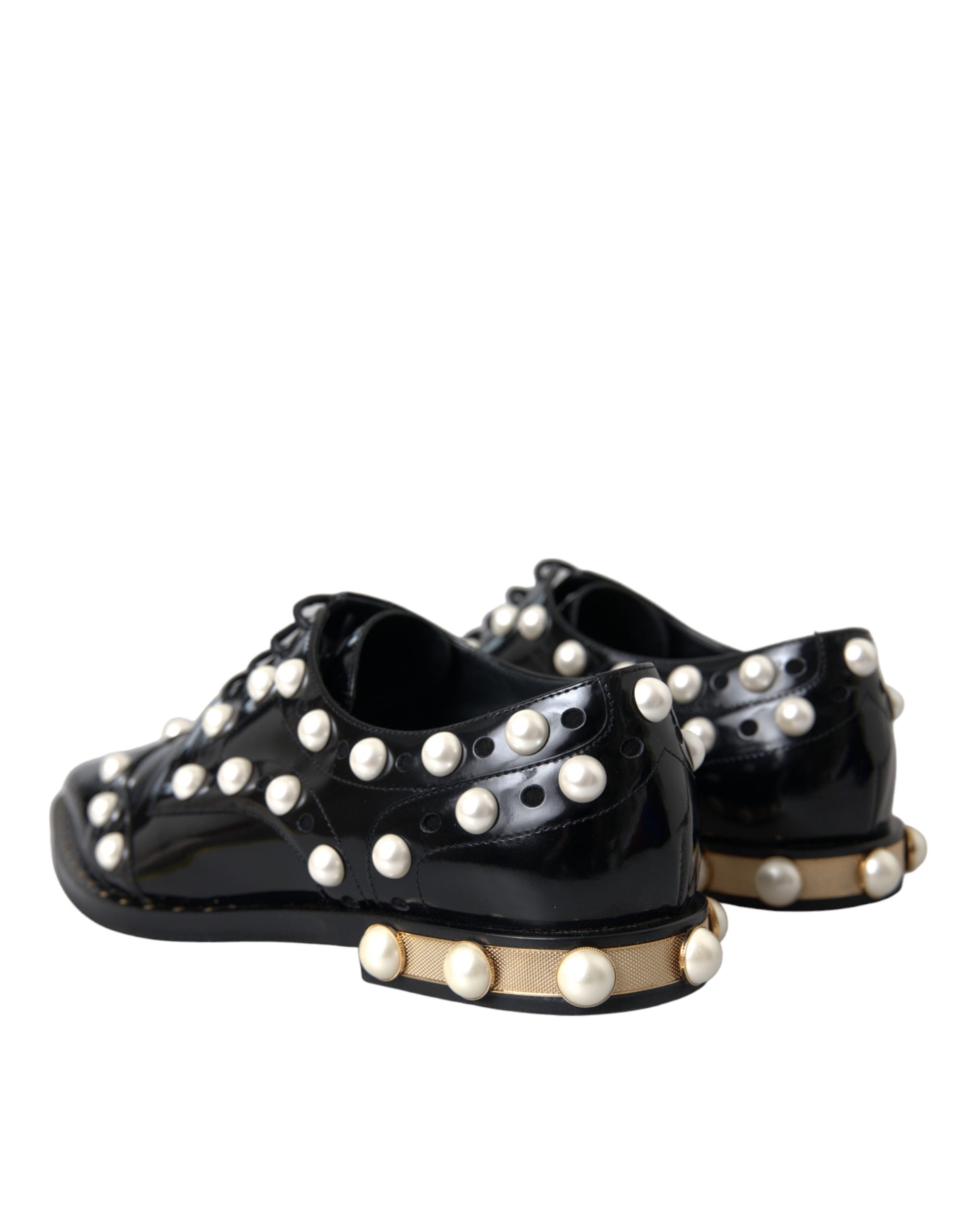 Chaussures brogue en cuir noir avec perles factices, de la marque Dolce & Gabbana, pour un style élégant et sophistiqué.