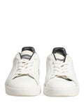Chaussures sneakers en cuir blanc et noir Dolce & Gabbana Portofino, style élégant avec détails en cuir rouge.