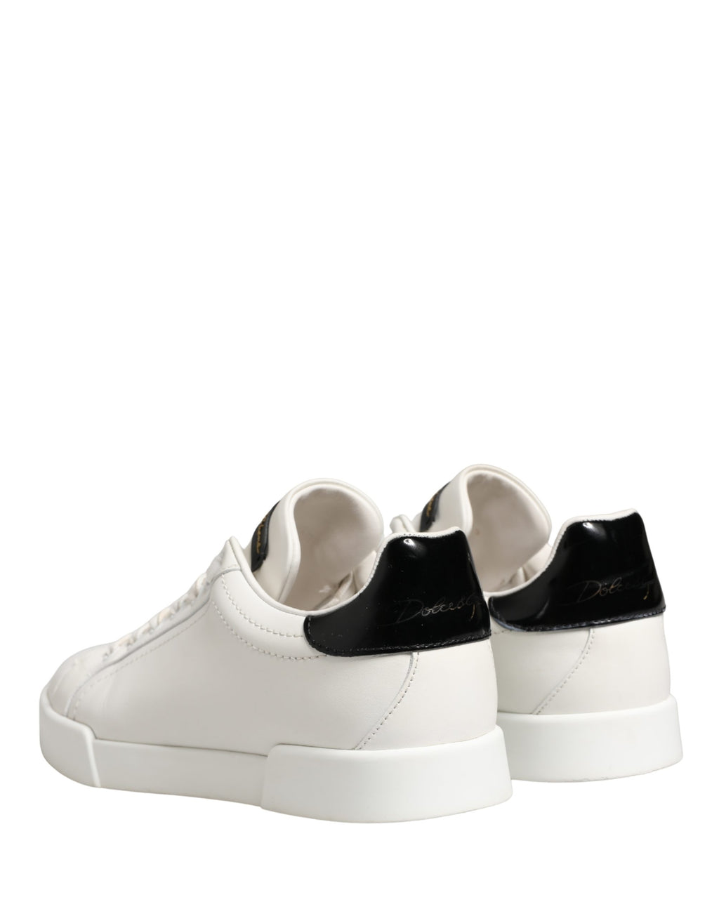 Chaussures sneakers en cuir blanc et noir Dolce & Gabbana Portofino, style élégant et moderne pour homme.