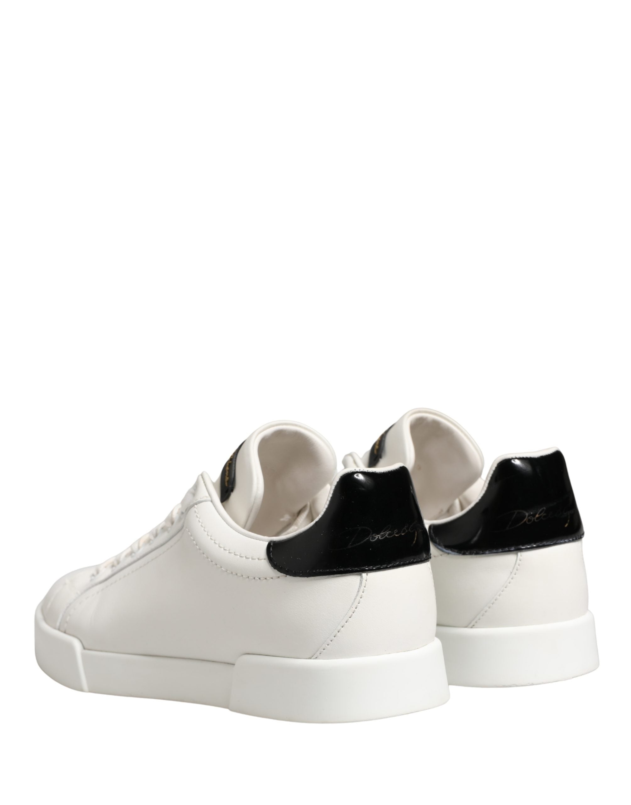 Chaussures sneakers en cuir blanc et noir Dolce & Gabbana Portofino, style élégant et moderne pour homme.