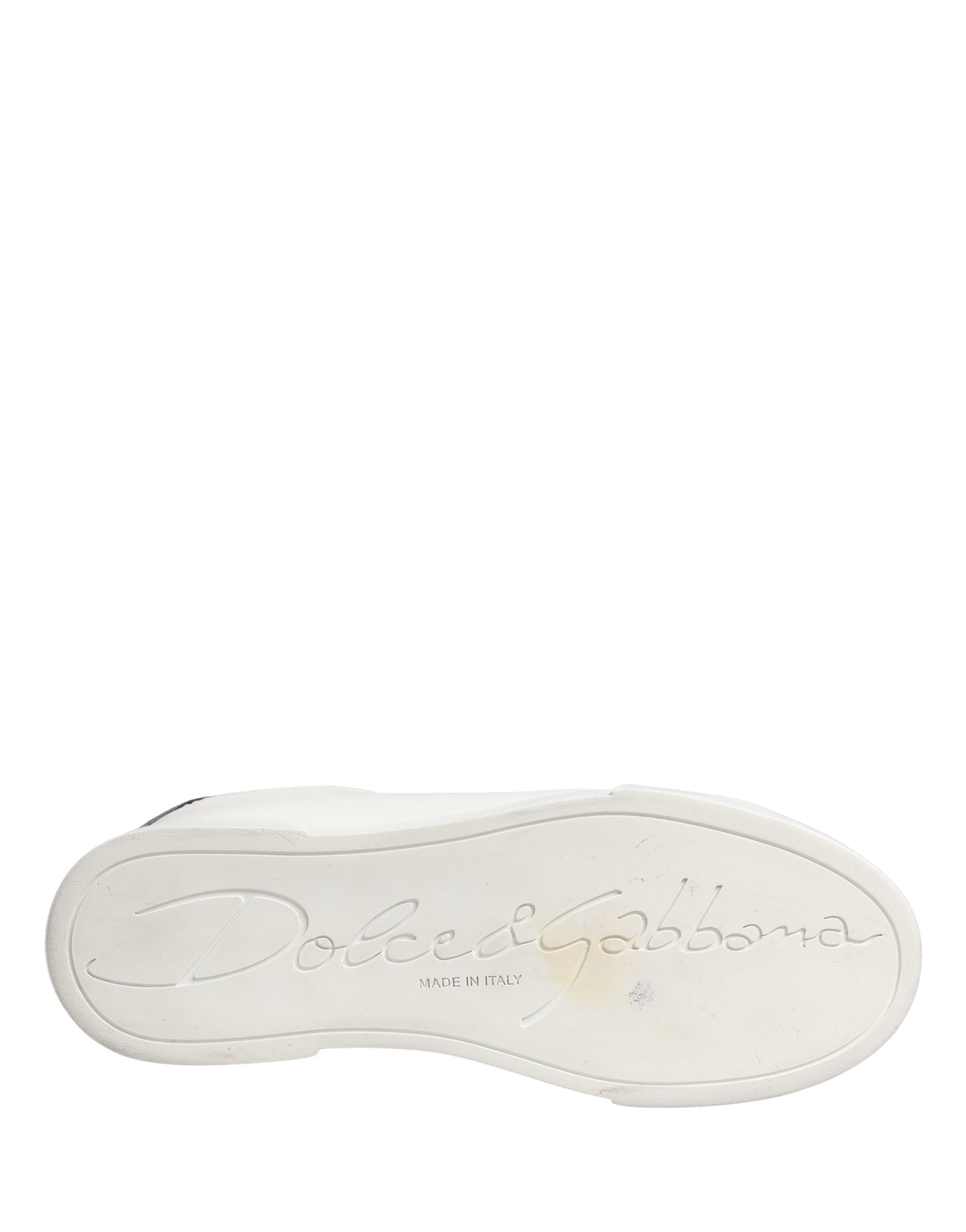 Chaussures sneakers en cuir blanc et noir Dolce & Gabbana Portofino, style élégant et moderne, vues de face.