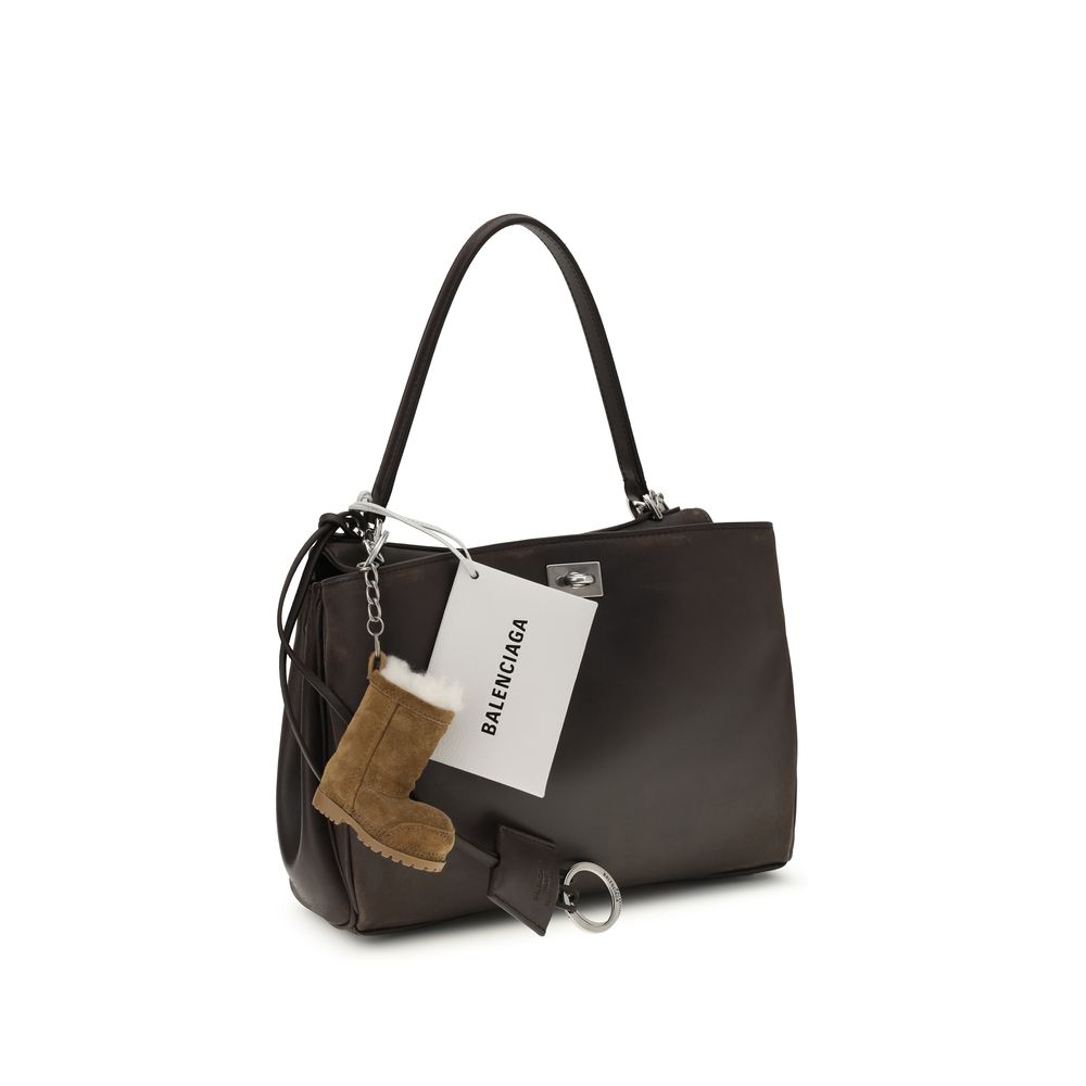 Sac à main Balenciaga Bos Taurus en cuir de veau marron, sac à épaule élégant et spacieux avec finition haut de gamme.