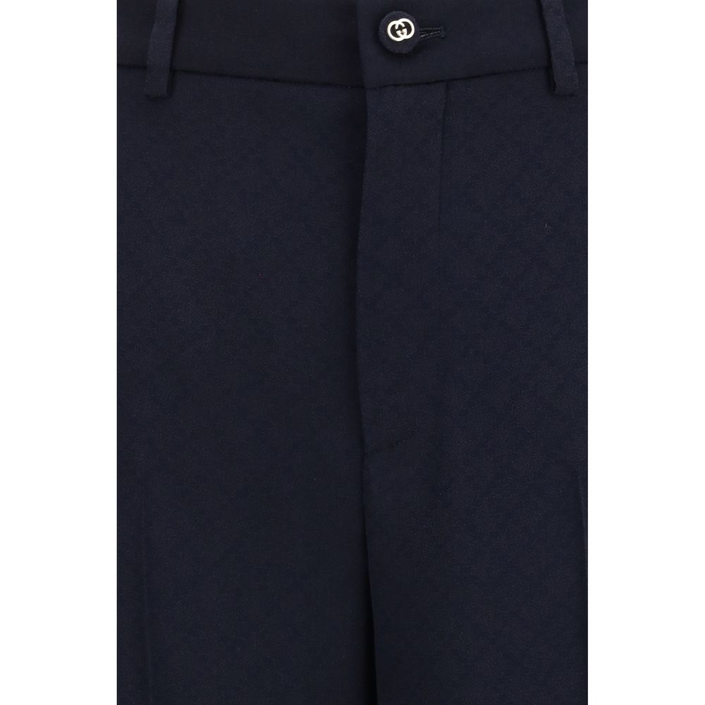 Pantalons décontractés en viscose bleue de Gucci, vue de face avec ceinture et coupe confortable.