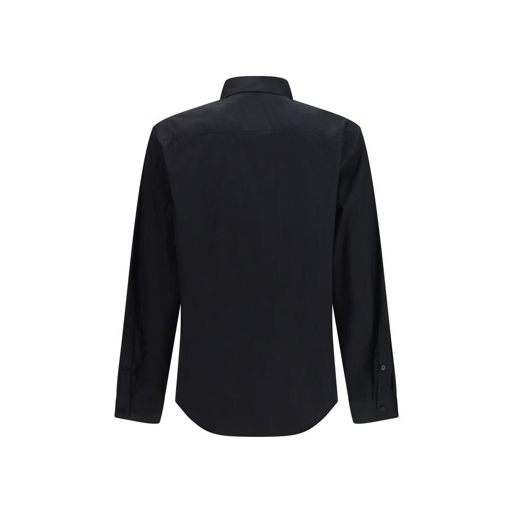 Chemise noire en coton de la marque Versace Jeans, vêtement élégant avec col et boutons visibles.