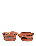 Sandales plates en cuir marron Dolce & Gabbana, chaussures élégantes avec finition en cuir naturel.