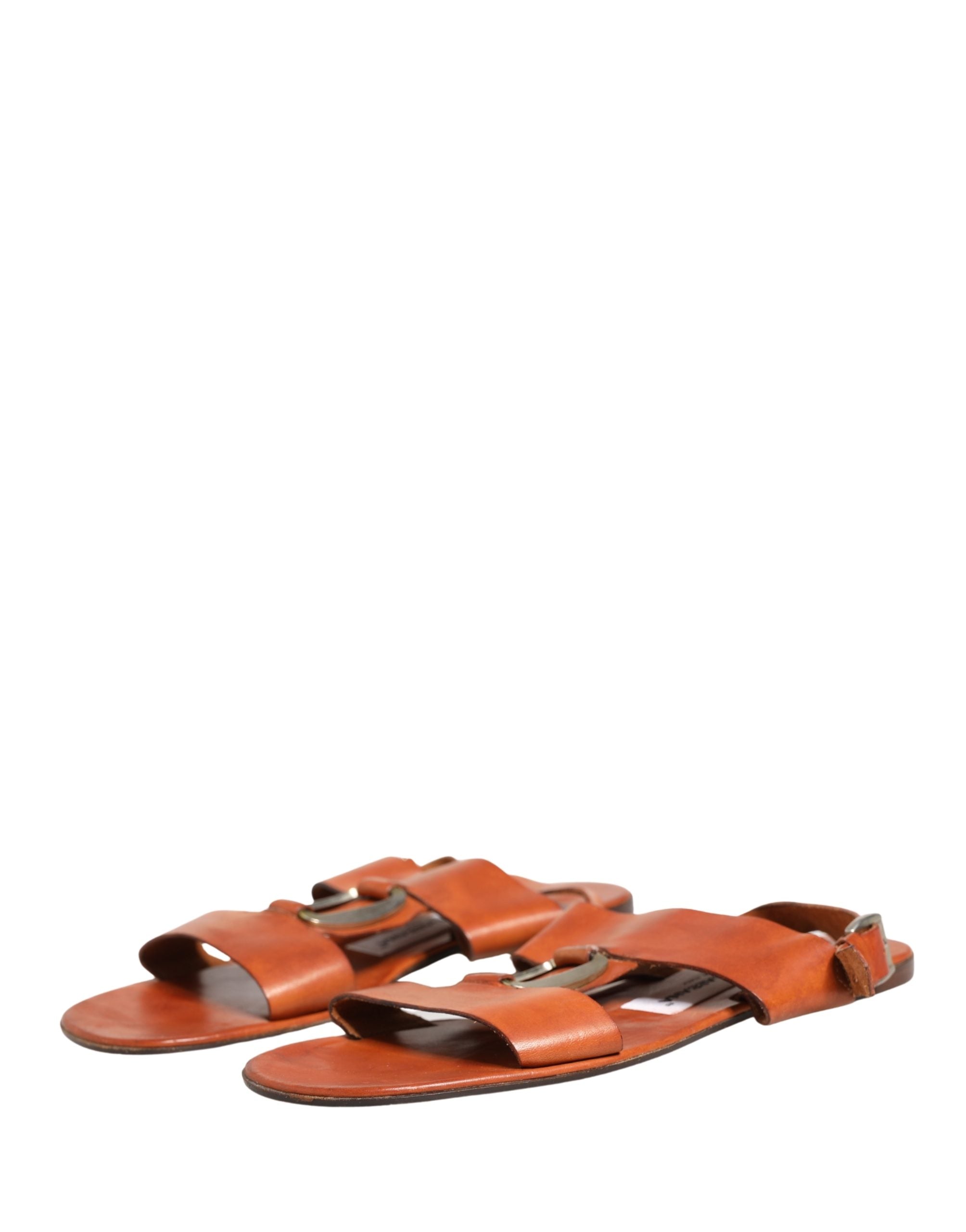 Sandales plates en cuir marron Dolce & Gabbana, chaussures élégantes en cuir avec semelle plate et design sophistiqué.