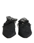 Sandales à talons noirs en dentelle Dolce & Gabbana avec bride fine et semelle élégante, parfait pour une tenue sophistiquée.