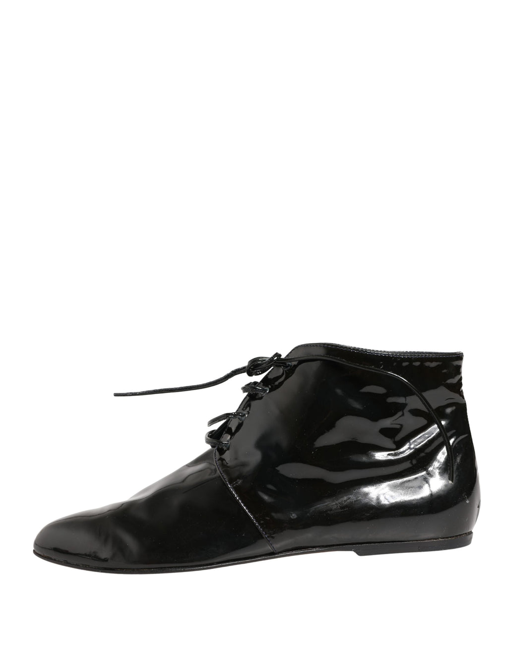 Chaussures bottines en cuir noir Dolce & Gabbana pour femme, élégantes et sophistiquées, visibles en gros plan sur fond neutre.