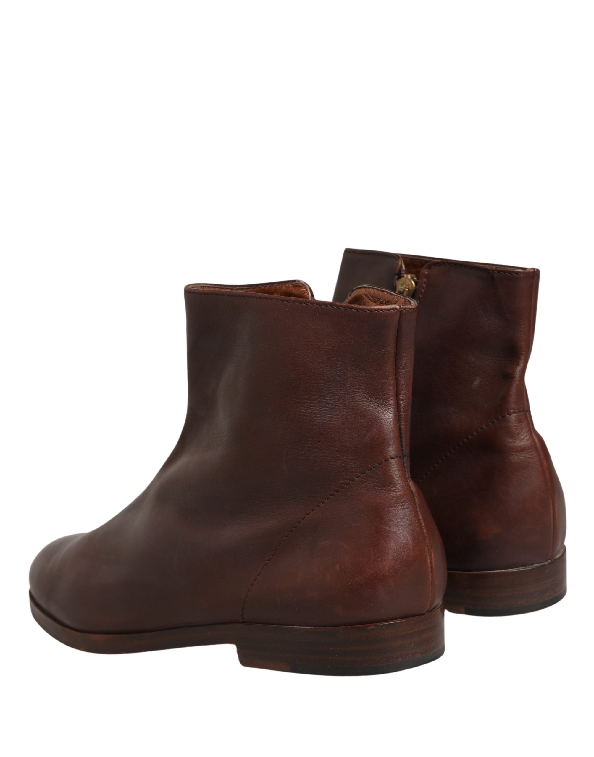 Chaussures Dolce & Gabbana bottines plates en cuir marron à semelle biker et ankle, style élégant et moderne.