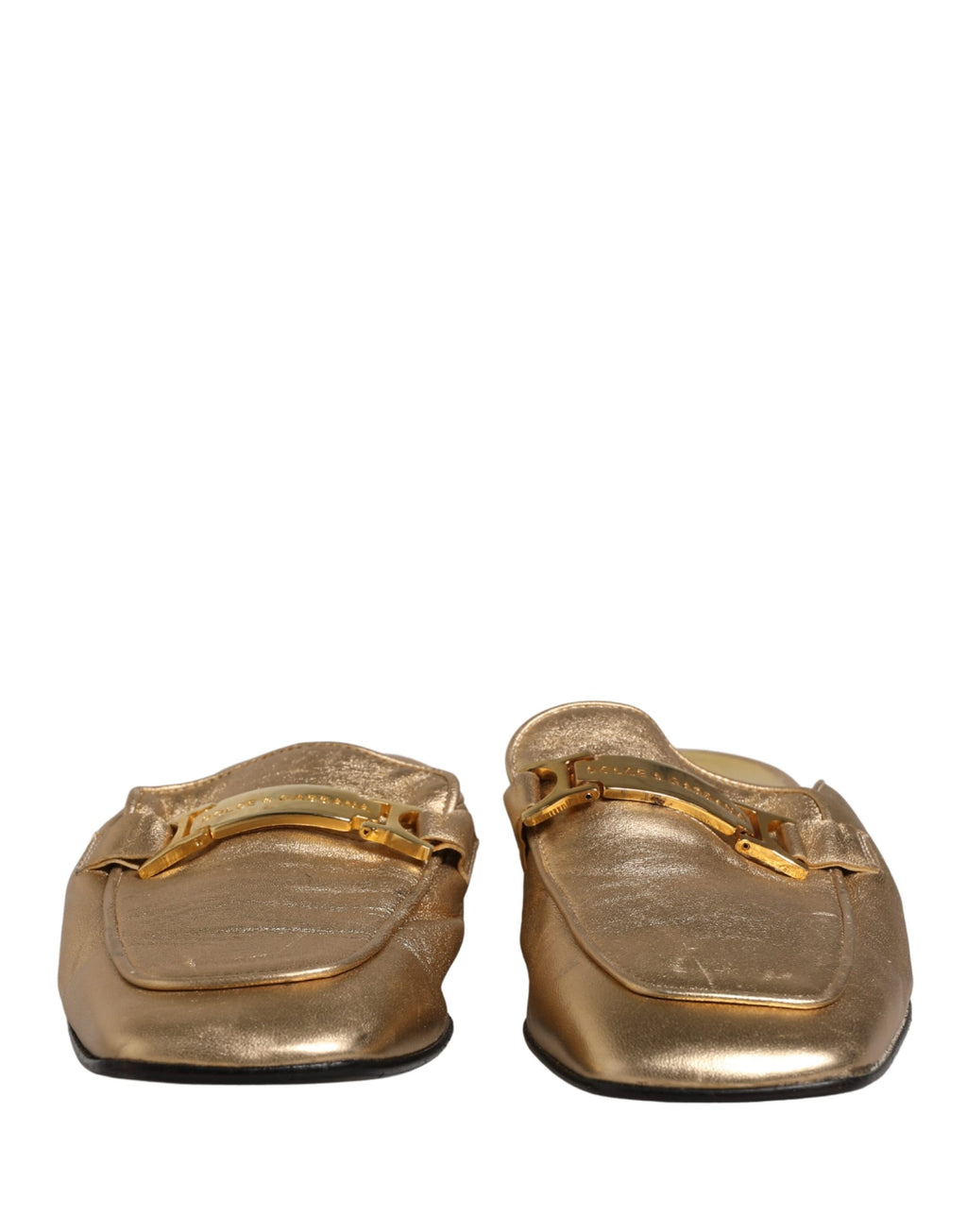 Chaussures Dolce & Gabbana, mules en cuir doré pour femmes, sandales plates et élégantes, visibles en détail.
