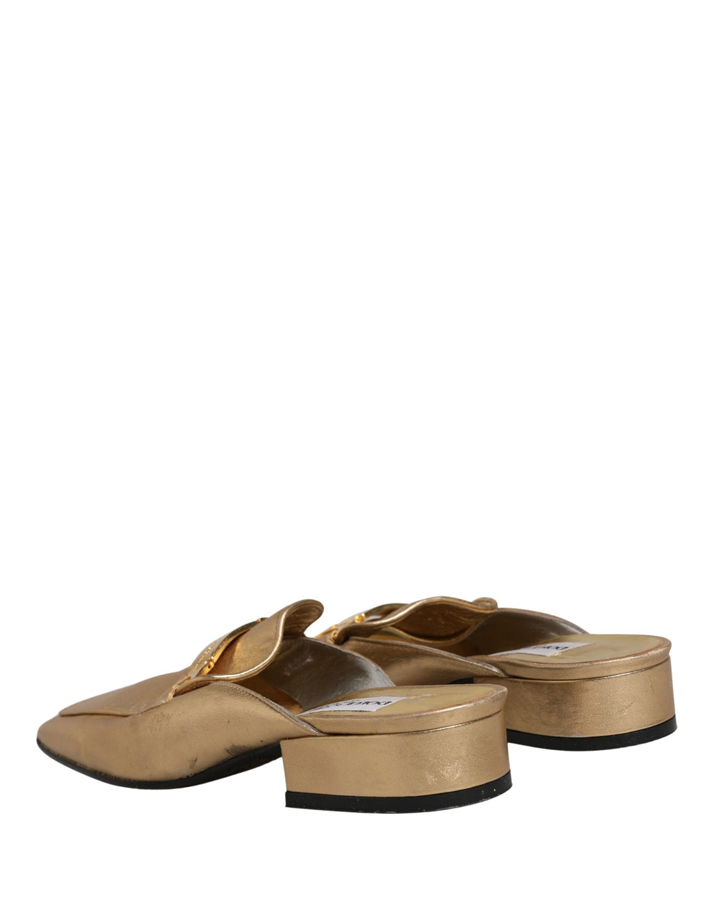 Chaussures Dolce & Gabbana en cuir doré, mules plates à enfiler, style flats slides pour femmes.
