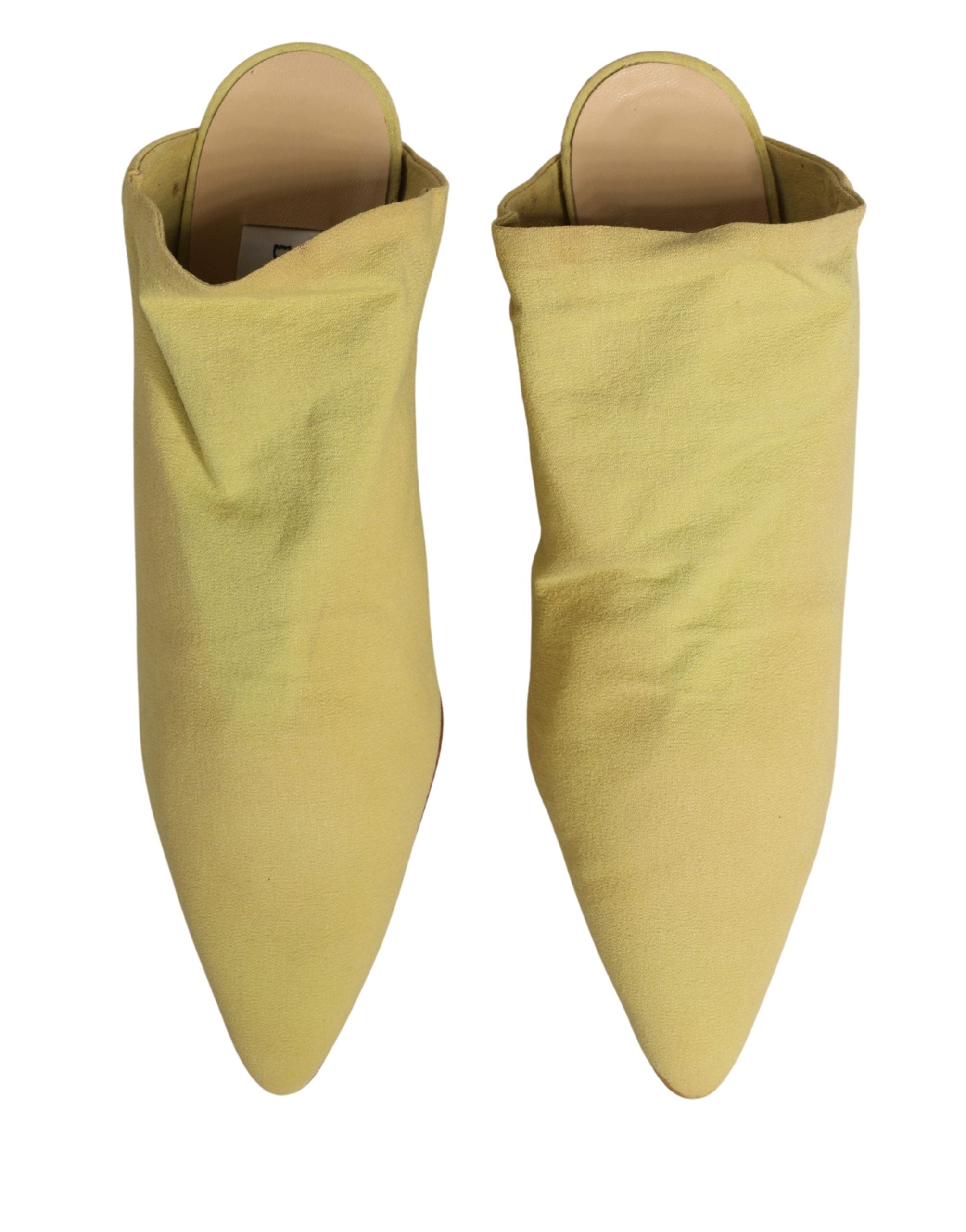Mules à talons en daim jaune Dolce & Gabbana, chaussures élégantes avec semelle fine et design sophistiqué.