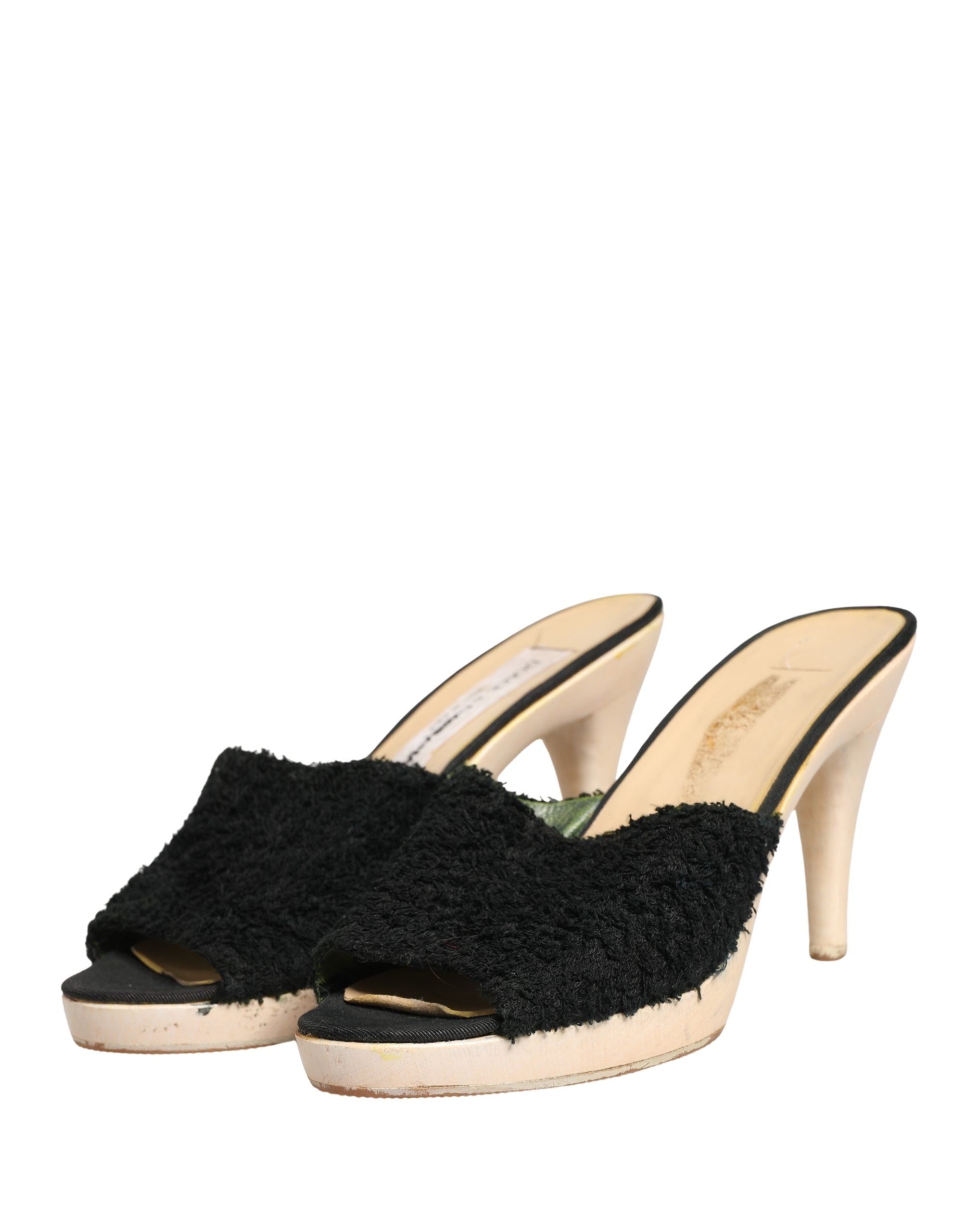 Chaussures mules en tissu noir Dolce & Gabbana avec plateforme en bois et détails en fourrure, vues de côté.
