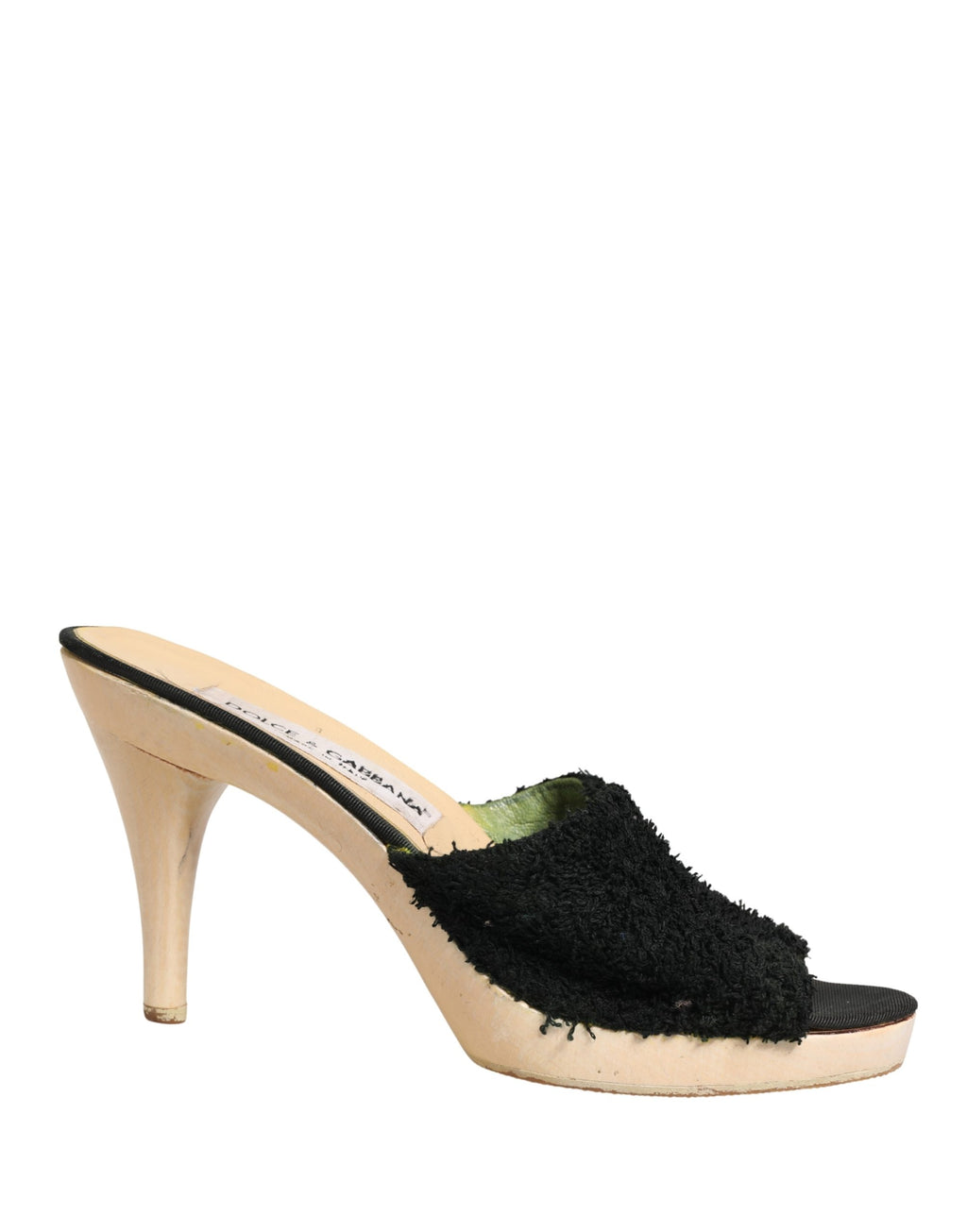 Chaussures Dolce & Gabbana mules en tissu noir avec fourrure et plateforme en bois, vue de côté.