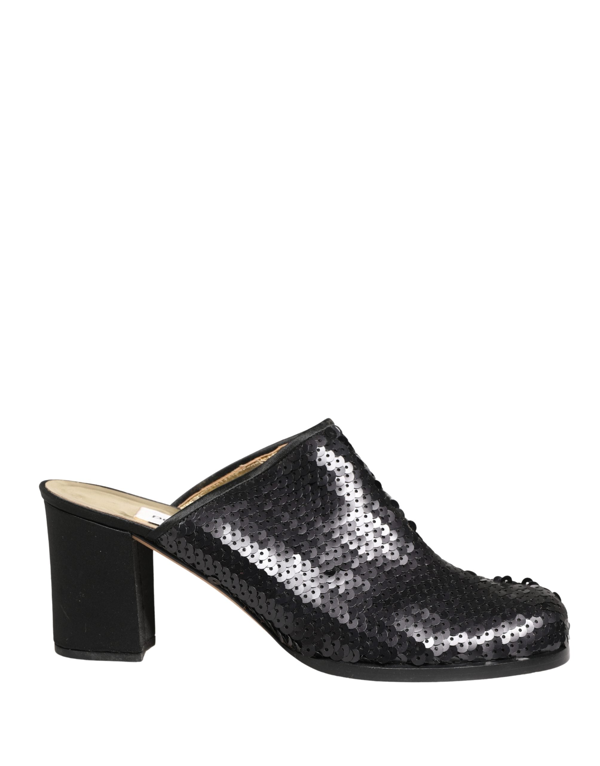 Mules noires Dolce & Gabbana ornées de sequins brillants, chaussures élégantes et sophistiquées.