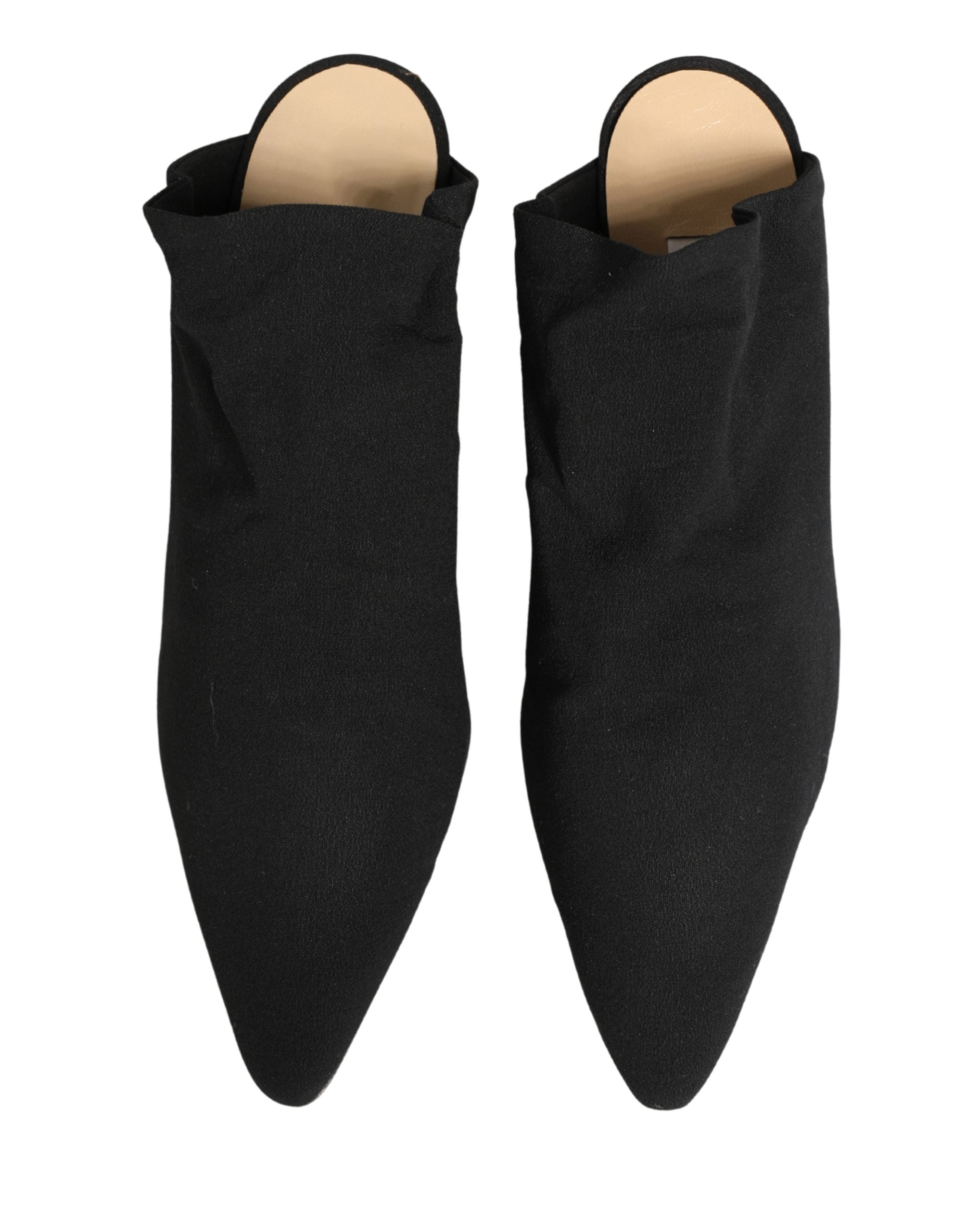 Escarpins mules en daim noir de Dolce & Gabbana, talons élégants et design sophistiqué, vus de côté sur fond blanc.