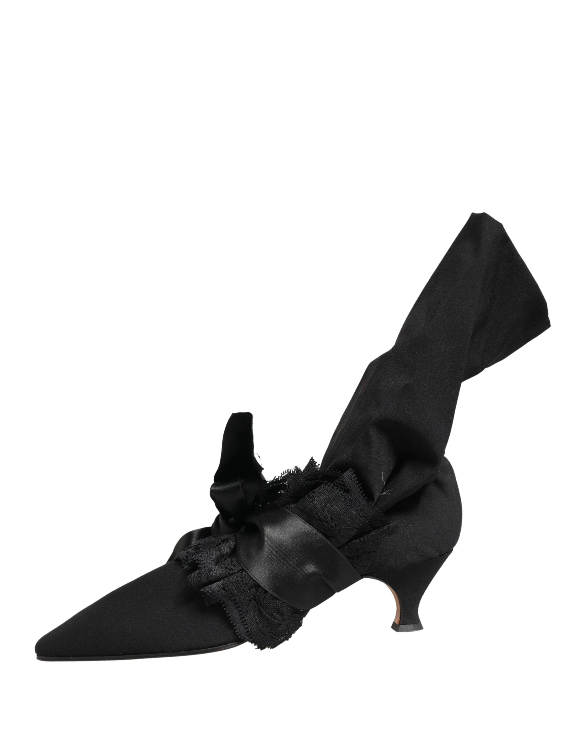 Bottes en daim noir Dolce & Gabbana mi-mollet, chaussures élégantes pour femmes, vue de profil.