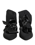 Bottines à talons en daim noir de Dolce & Gabbana pour femme, chaussures élégantes et sophistiquées.