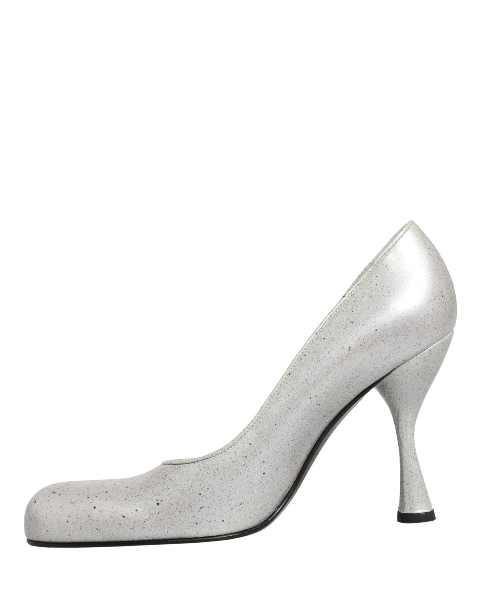 Escarpins en cuir blanc pour femme de Dolce & Gabbana, chaussures à talons élégantes et sophistiquées.