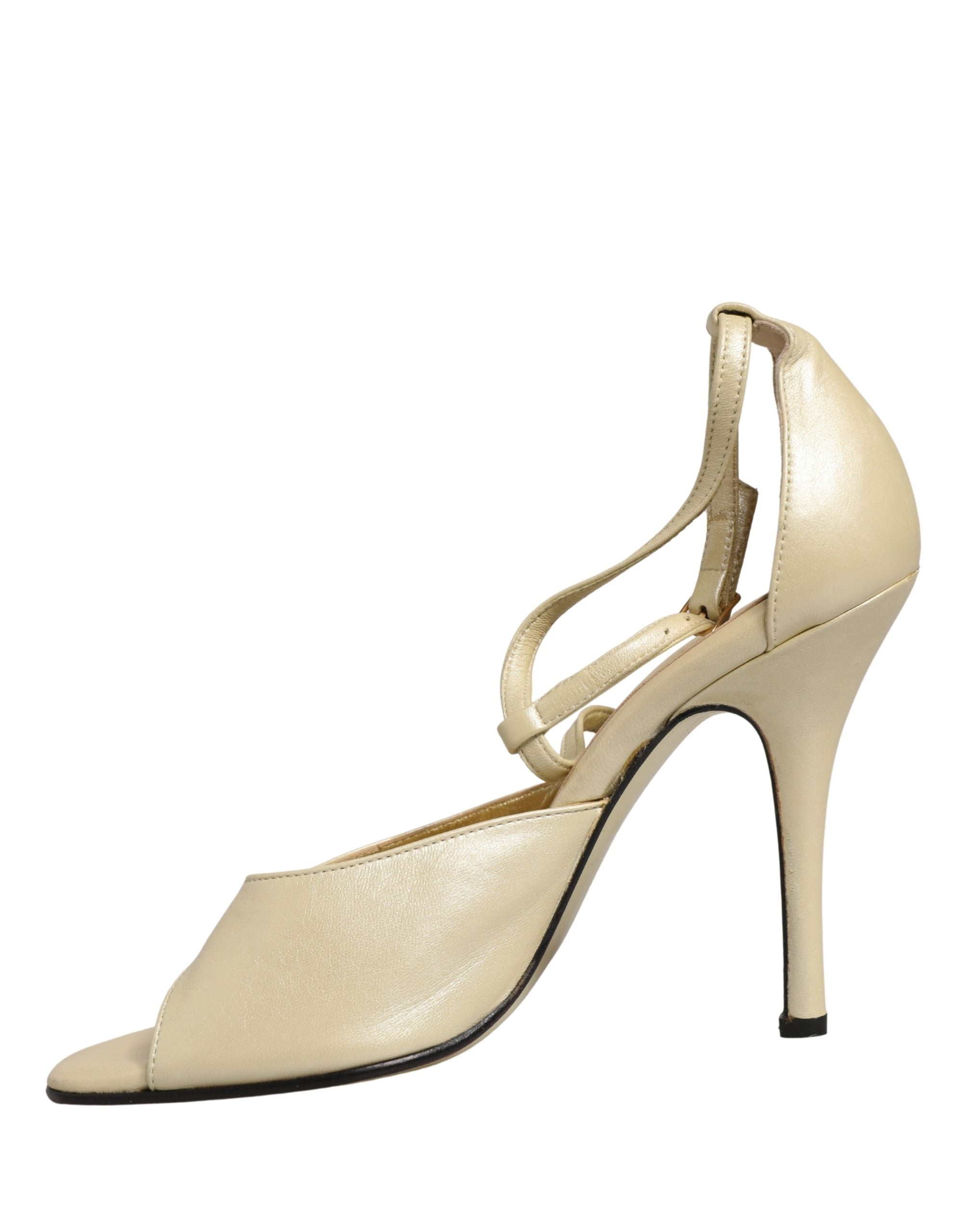 Sandales à talons stilettos en cuir beige de Dolce & Gabbana, chaussures élégantes pour femme.