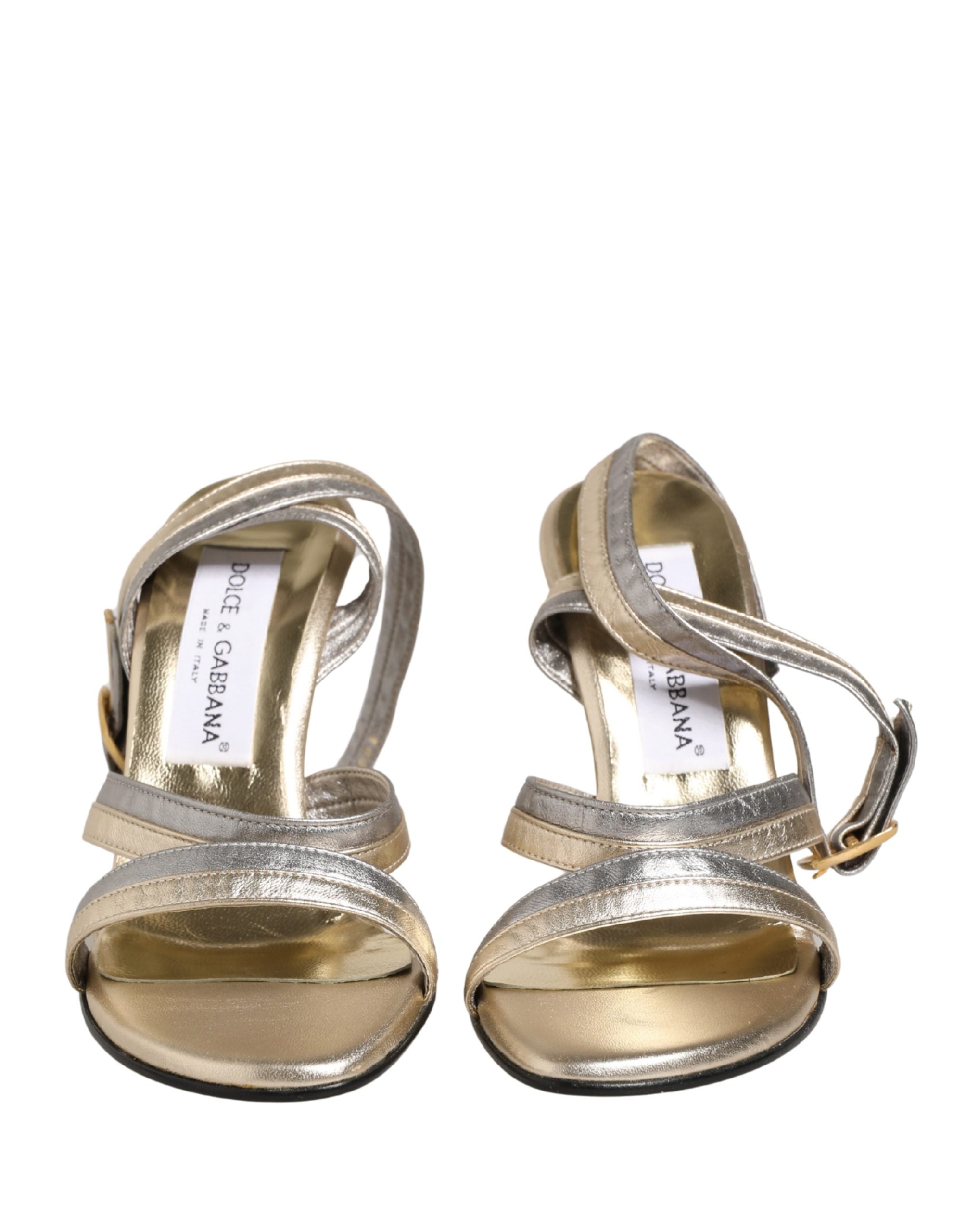 Sandales Dolce & Gabbana en cuir doré et argenté avec semelle compensée en forme de sabot, élégantes et modernes.