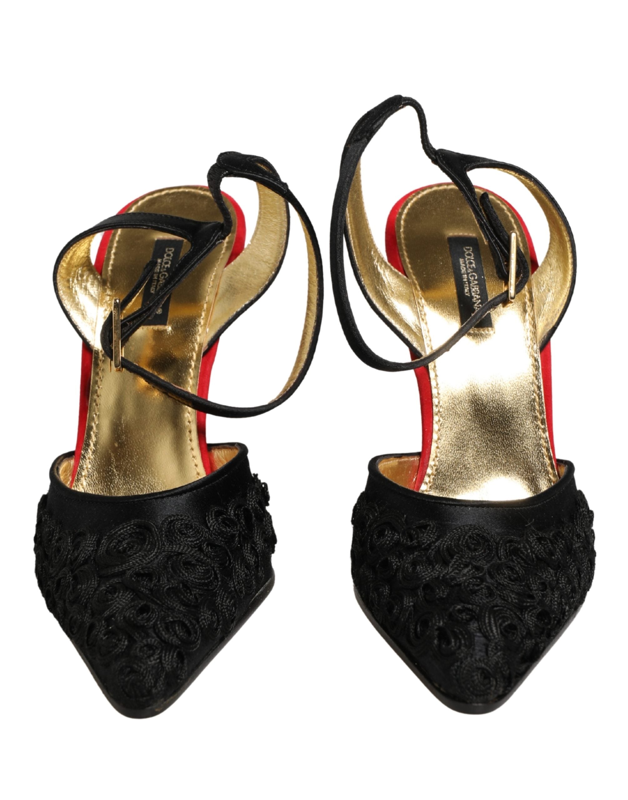 Sandales à talons noires en satin Dolce & Gabbana avec bride à la cheville et motif floral élégants.