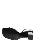 Sandales à talons Dolce & Gabbana noires et argentées avec motif floral, chaussures élégantes pour femmes.