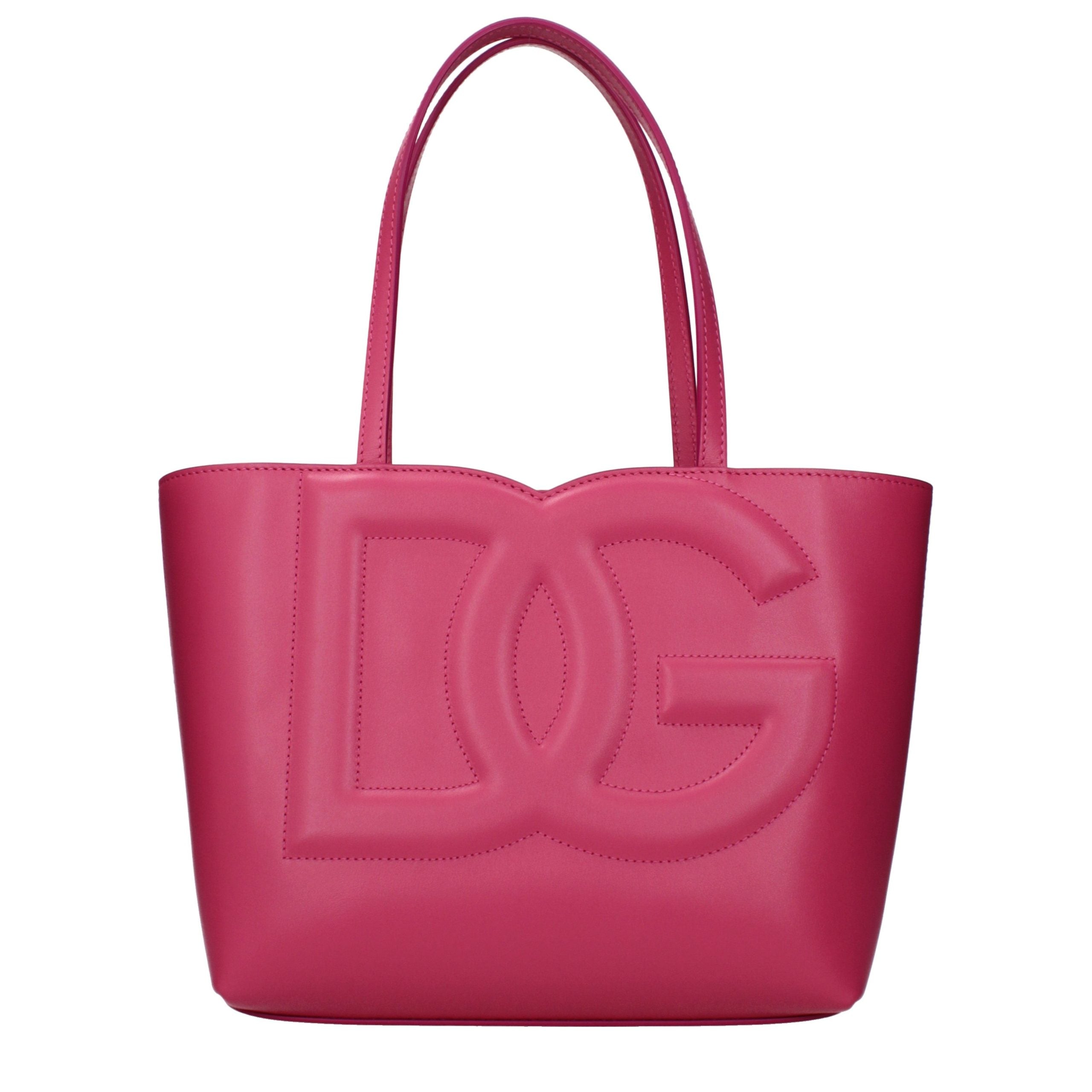 Sac à main en cuir rose Dolce & Gabbana, élégant et sophistiqué, avec détails en or et poignée en cuir.