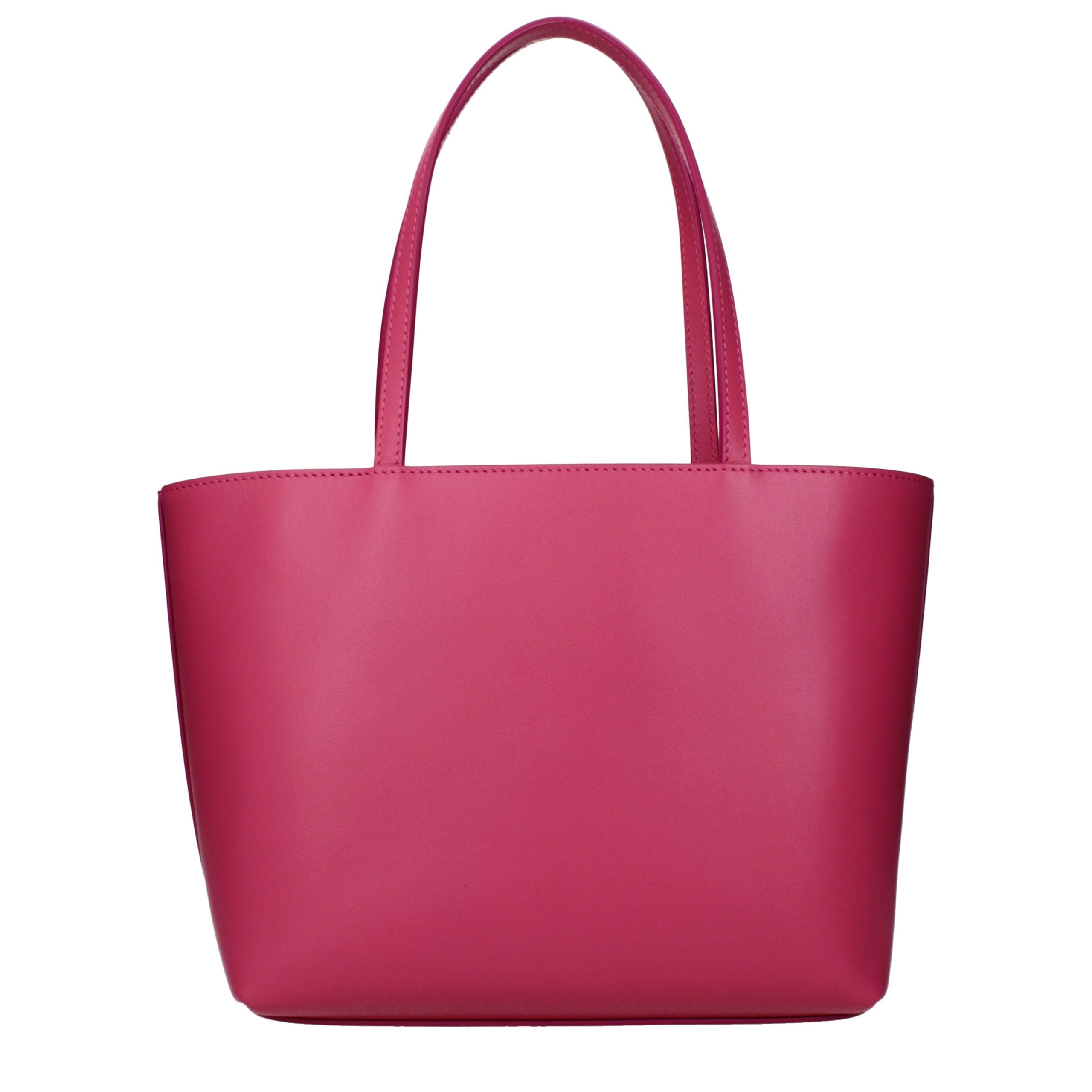 Sac à main en cuir rose de Dolce & Gabbana, élégant et sophistiqué, avec détails en or et finition raffinée.