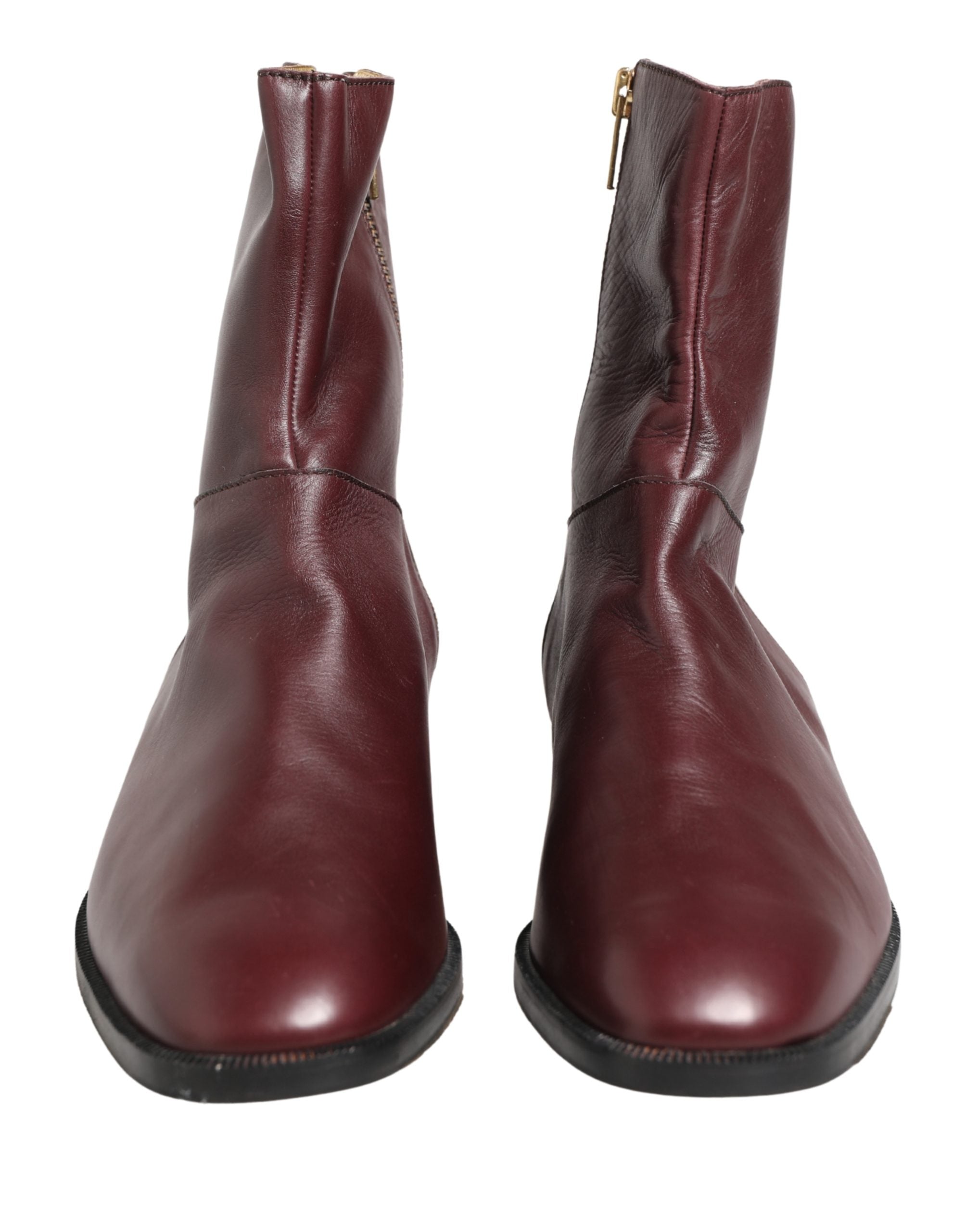 Chaussures Dolce & Gabbana, bottines plates en cuir bordeaux biker à la cheville, élégantes et tendance.