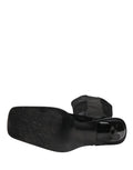Bottes hautes en cuir suédé noir de Dolce & Gabbana, chaussures élégantes et sophistiquées pour femmes.