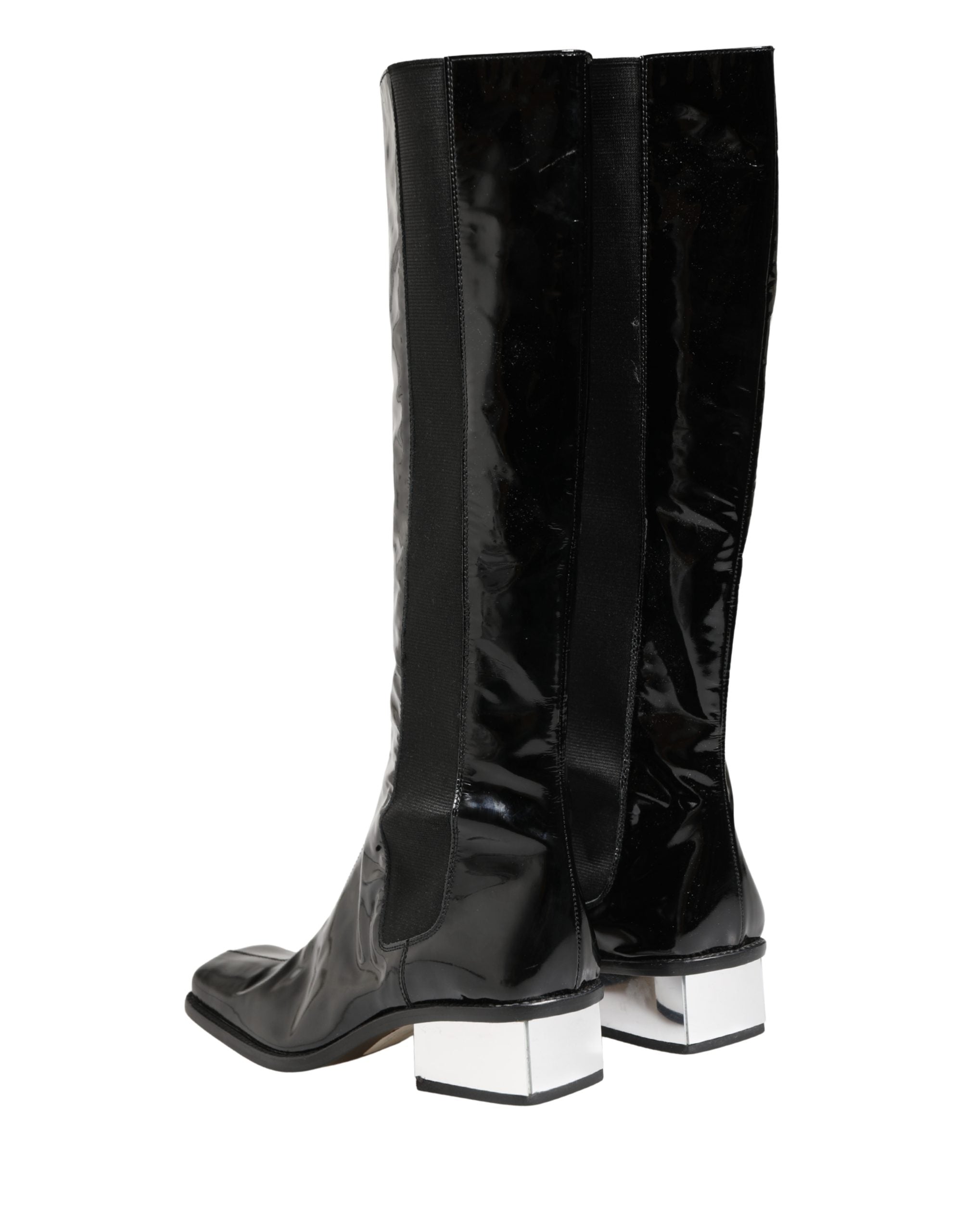 Bottes hautes en cuir verni noir de marque Dolce & Gabbana, chaussures élégantes en style sophistiqué.