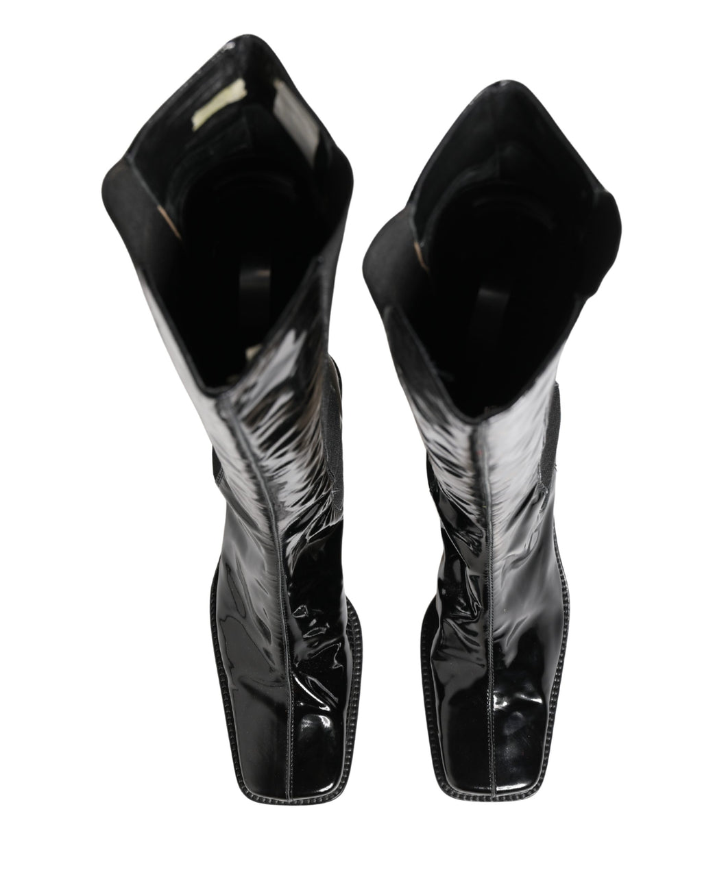 Bottes hautes en cuir verni noir Dolce & Gabbana, chaussures élégantes en cuir brillant, longueur genou, style sophistiqué.