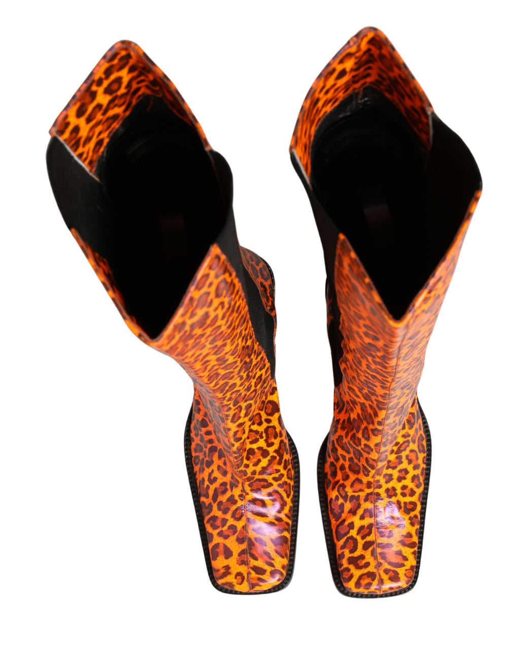Bottes hautes en cuir léopard marron de Dolce & Gabbana, style élégant et sophistiqué pour femmes.
