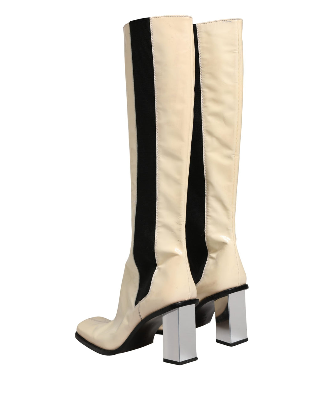 Chaussures bottines en cuir blanc et noir Dolce & Gabbana, bottes hautes jusqu’au genou, élégantes et sophistiquées.